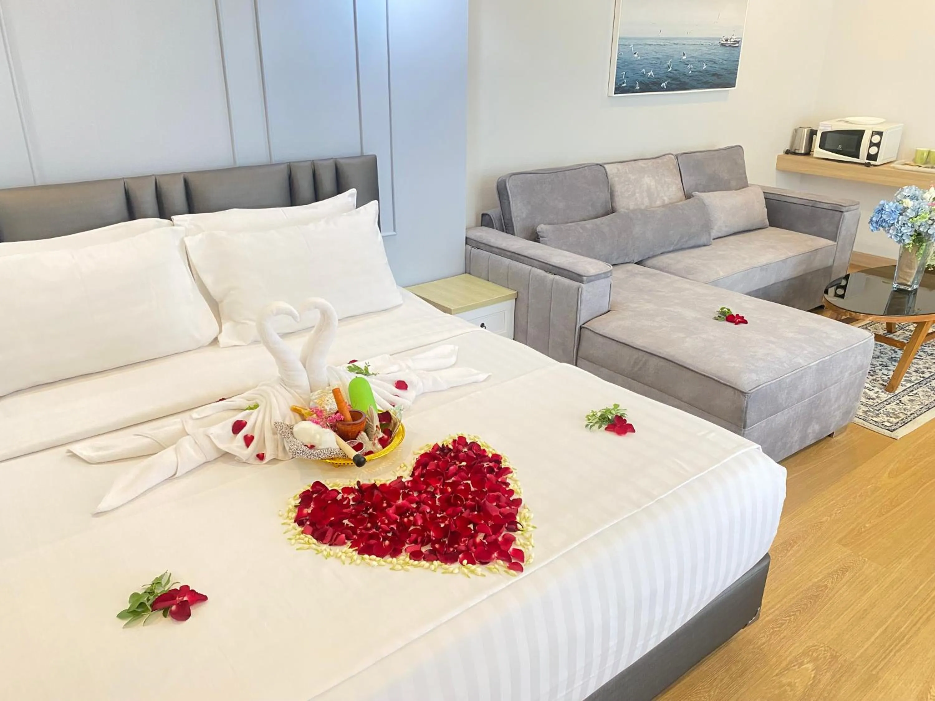 Bed in La Riva Boutique Hotel