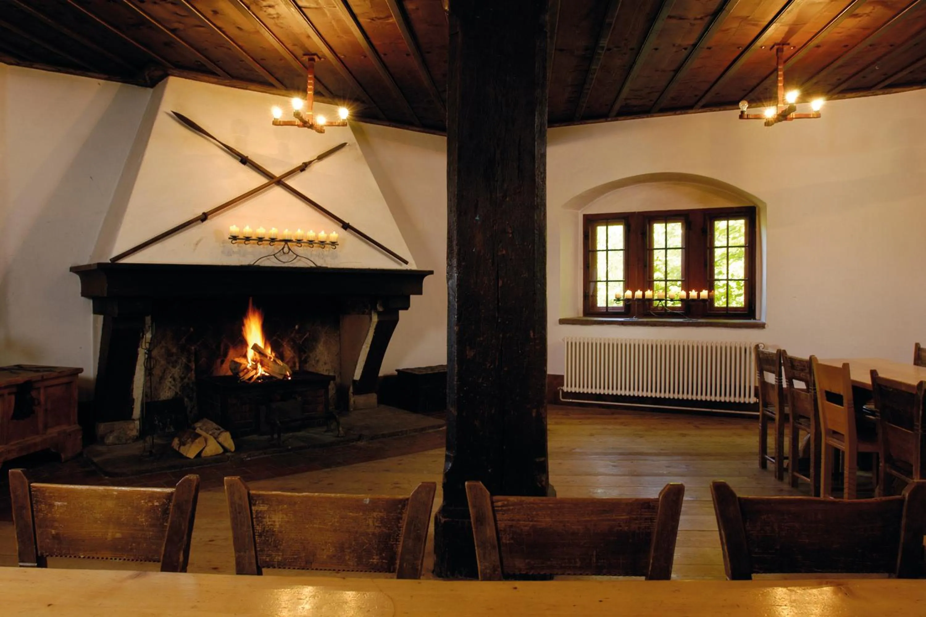 Communal lounge/ TV room in Mariastein-Rotberg Youth Hostel