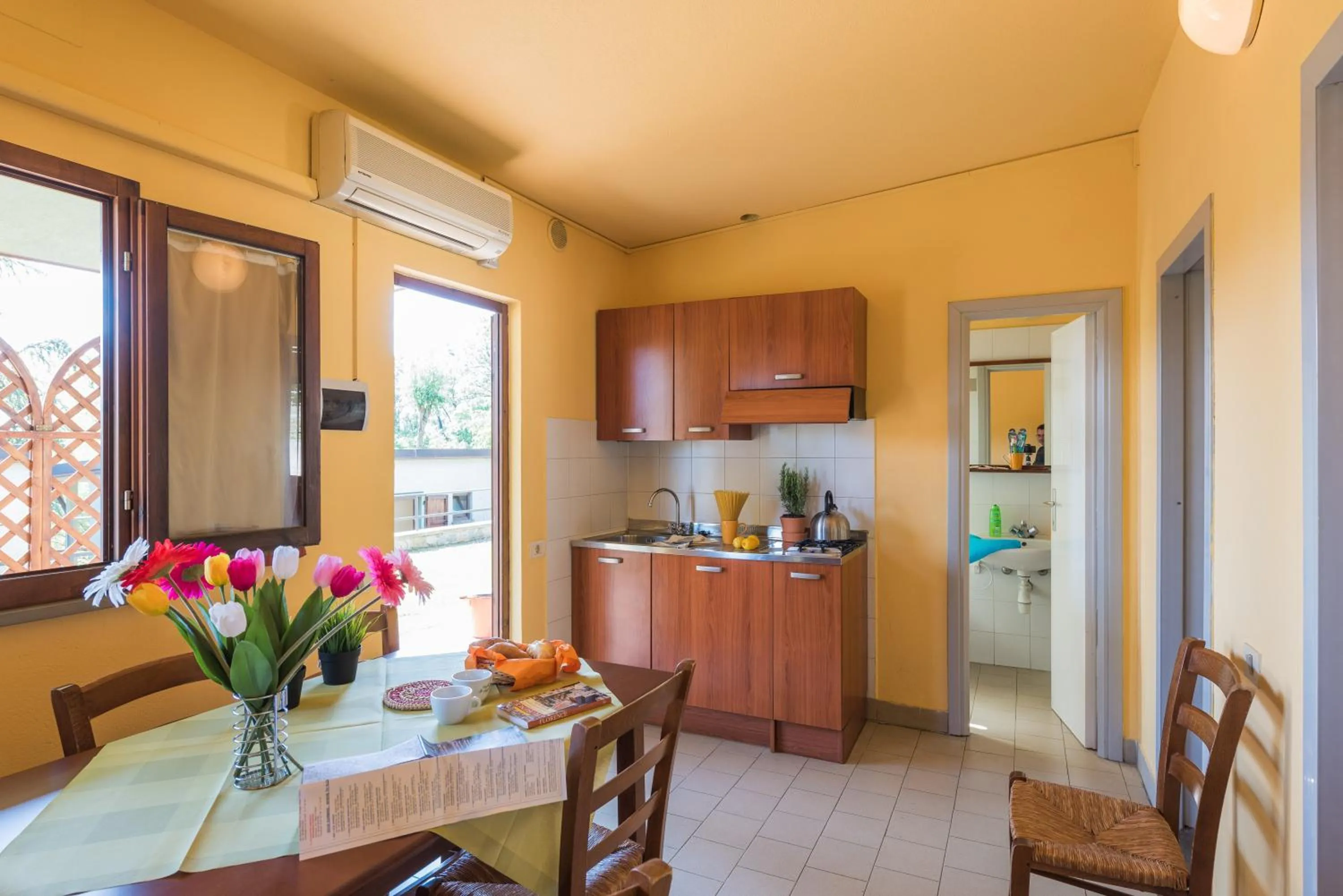 Kitchen or kitchenette in Camping Village Il Poggetto