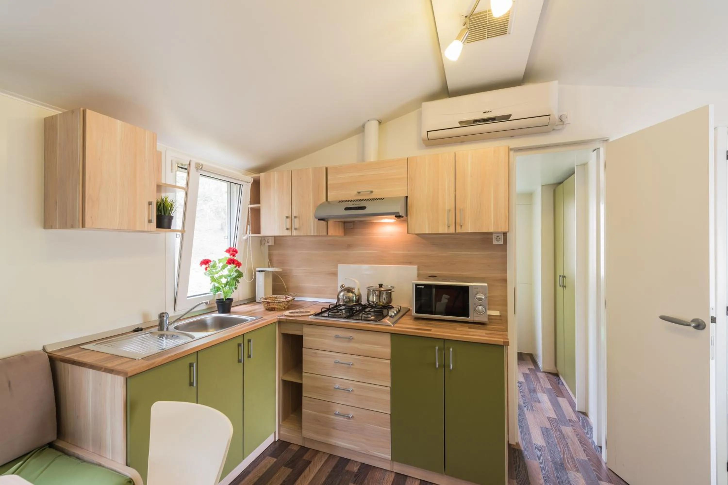 Kitchen or kitchenette in Camping Village Il Poggetto