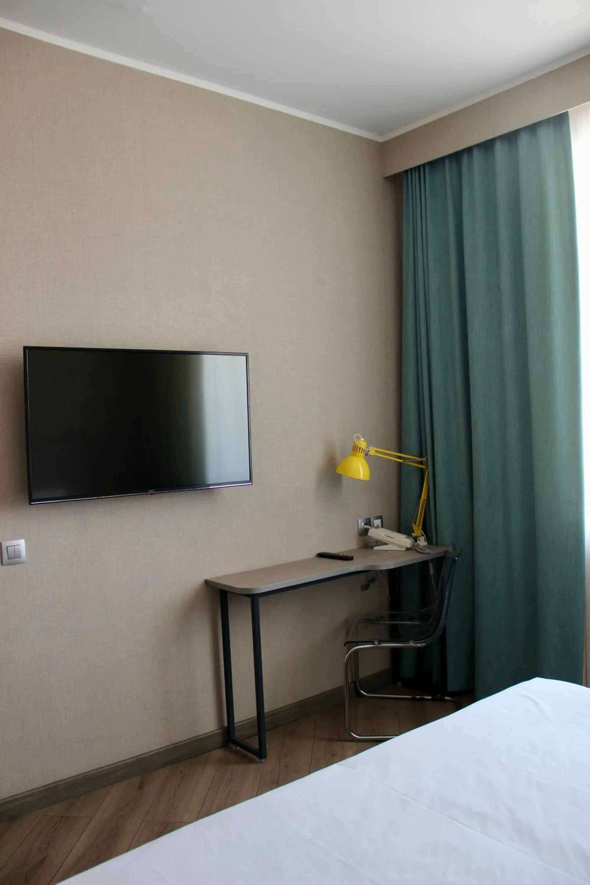 Bed in City Hotel Shymkent