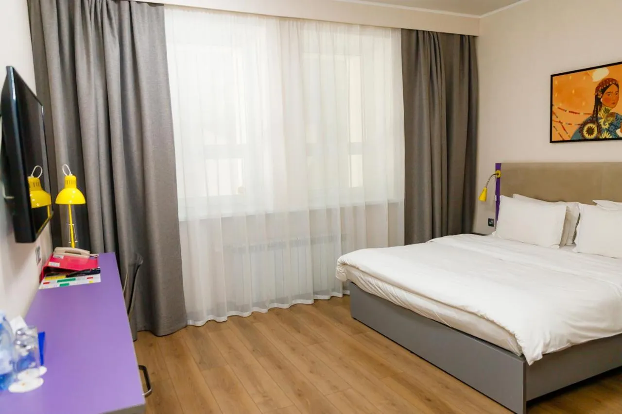 Bed in City Hotel Shymkent