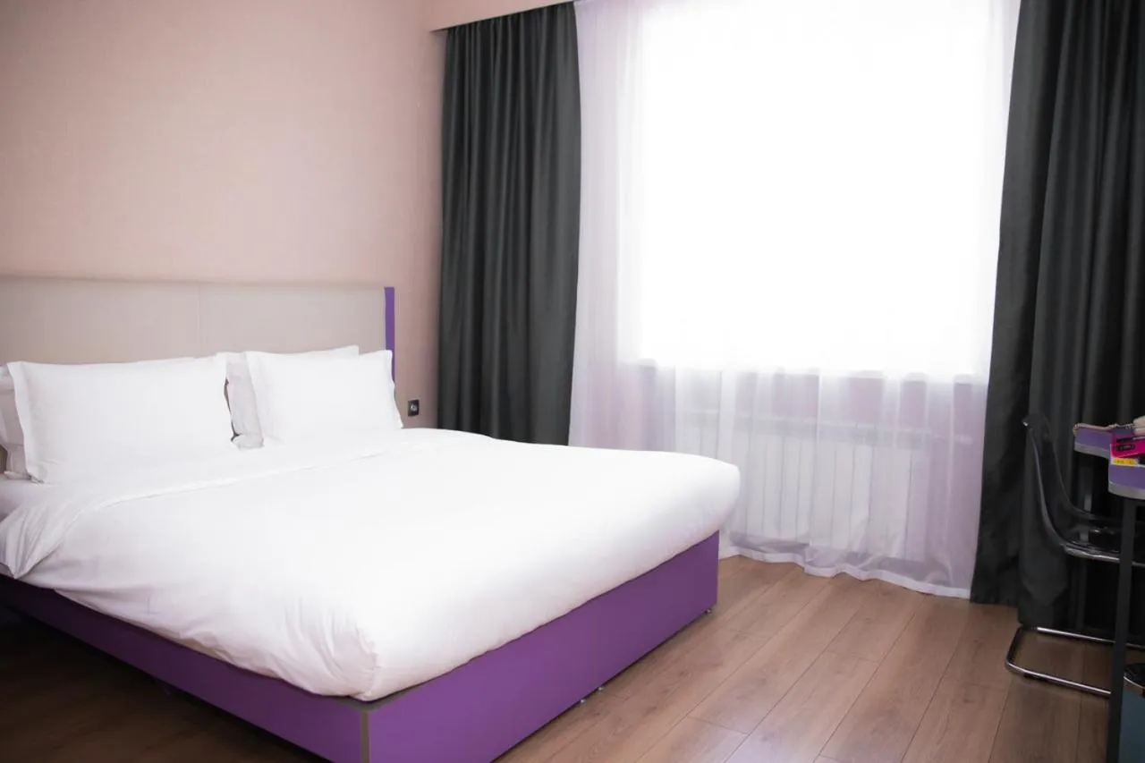 Bed in City Hotel Shymkent