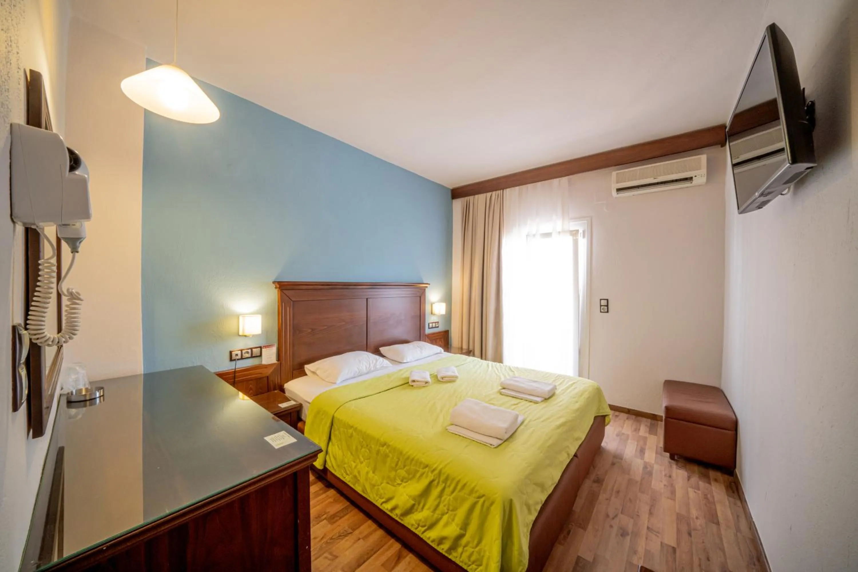 Bed in Hotel Olympion