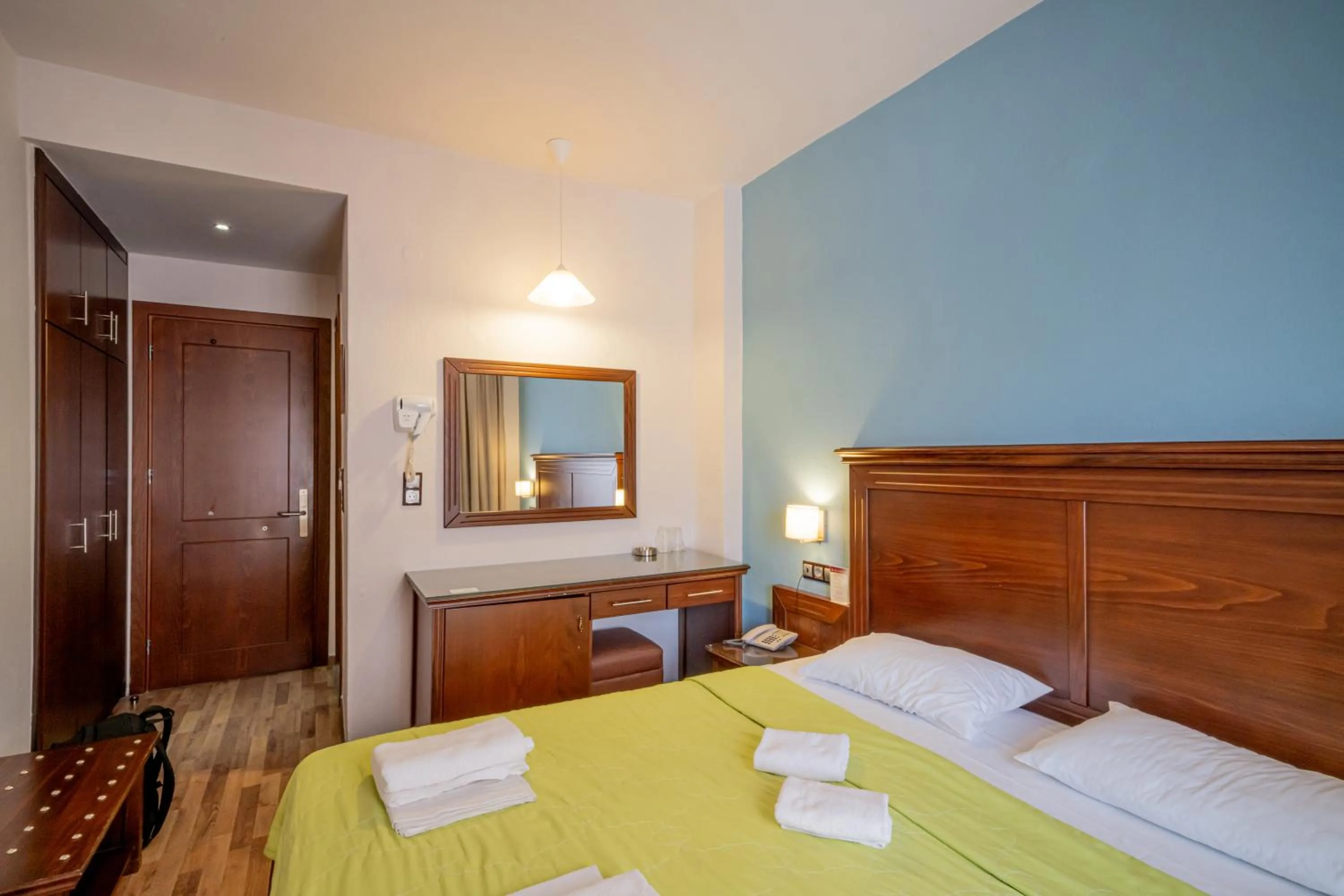 Bed in Hotel Olympion