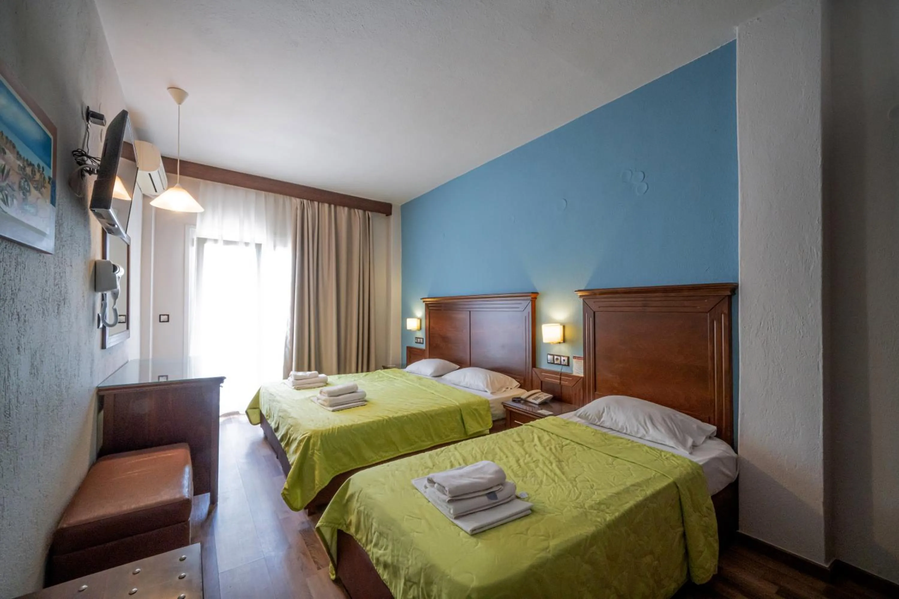 Bed in Hotel Olympion