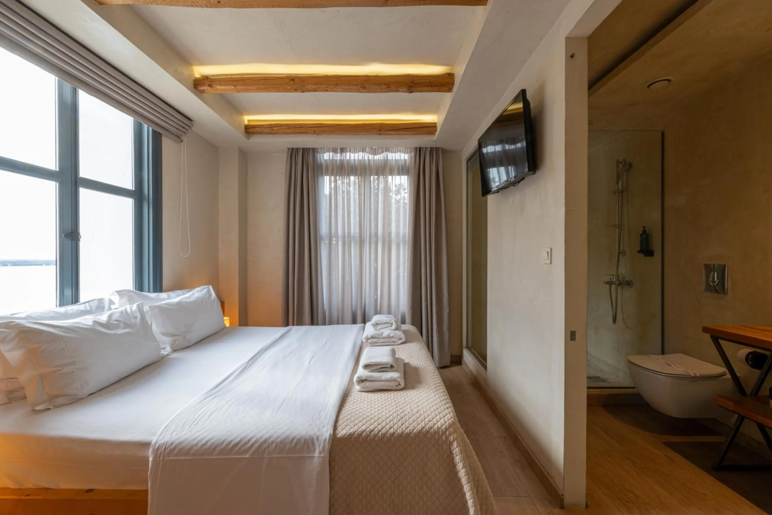 Photo of the whole room, Bed in Panellinion Luxury Rooms