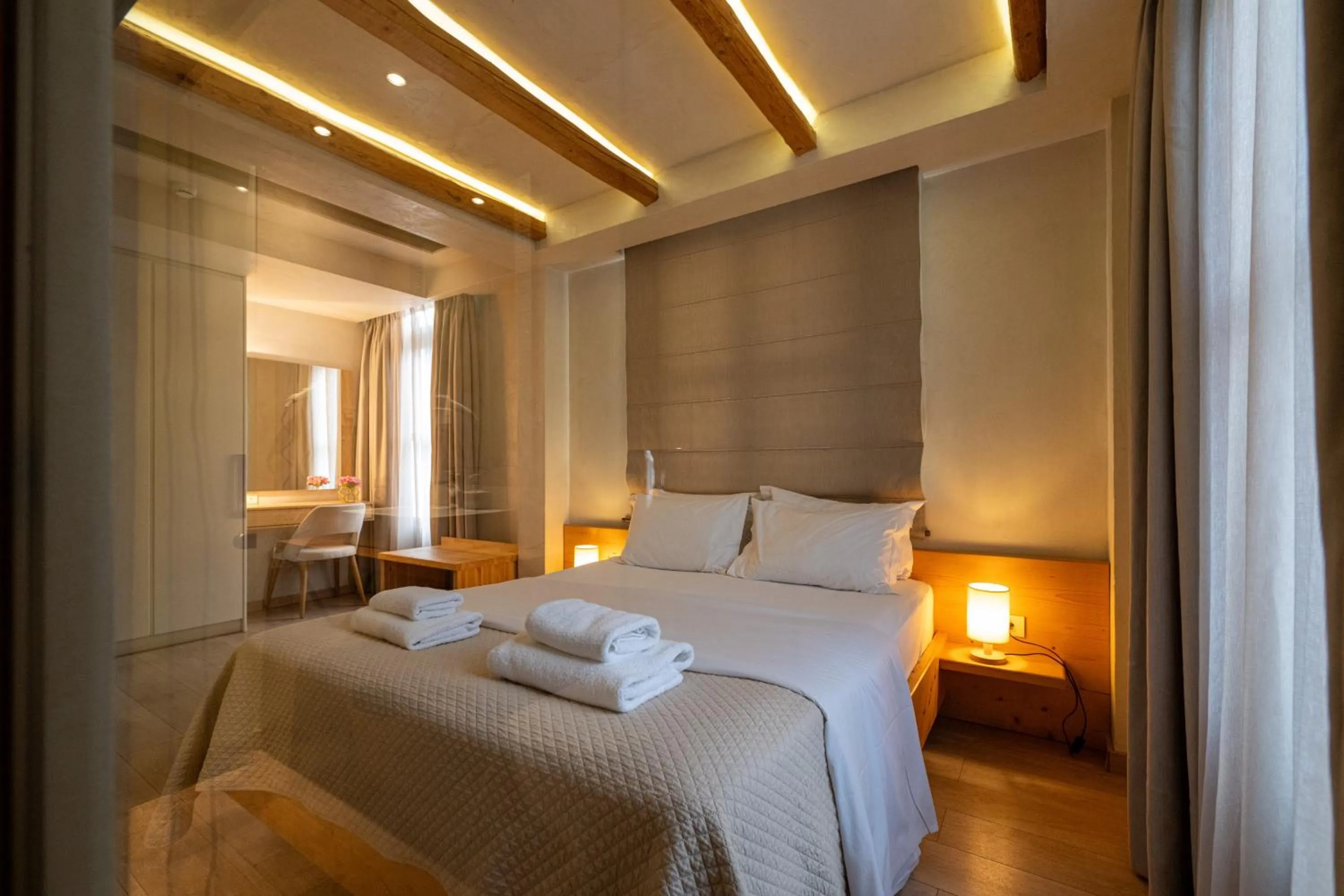 Photo of the whole room, Bed in Panellinion Luxury Rooms