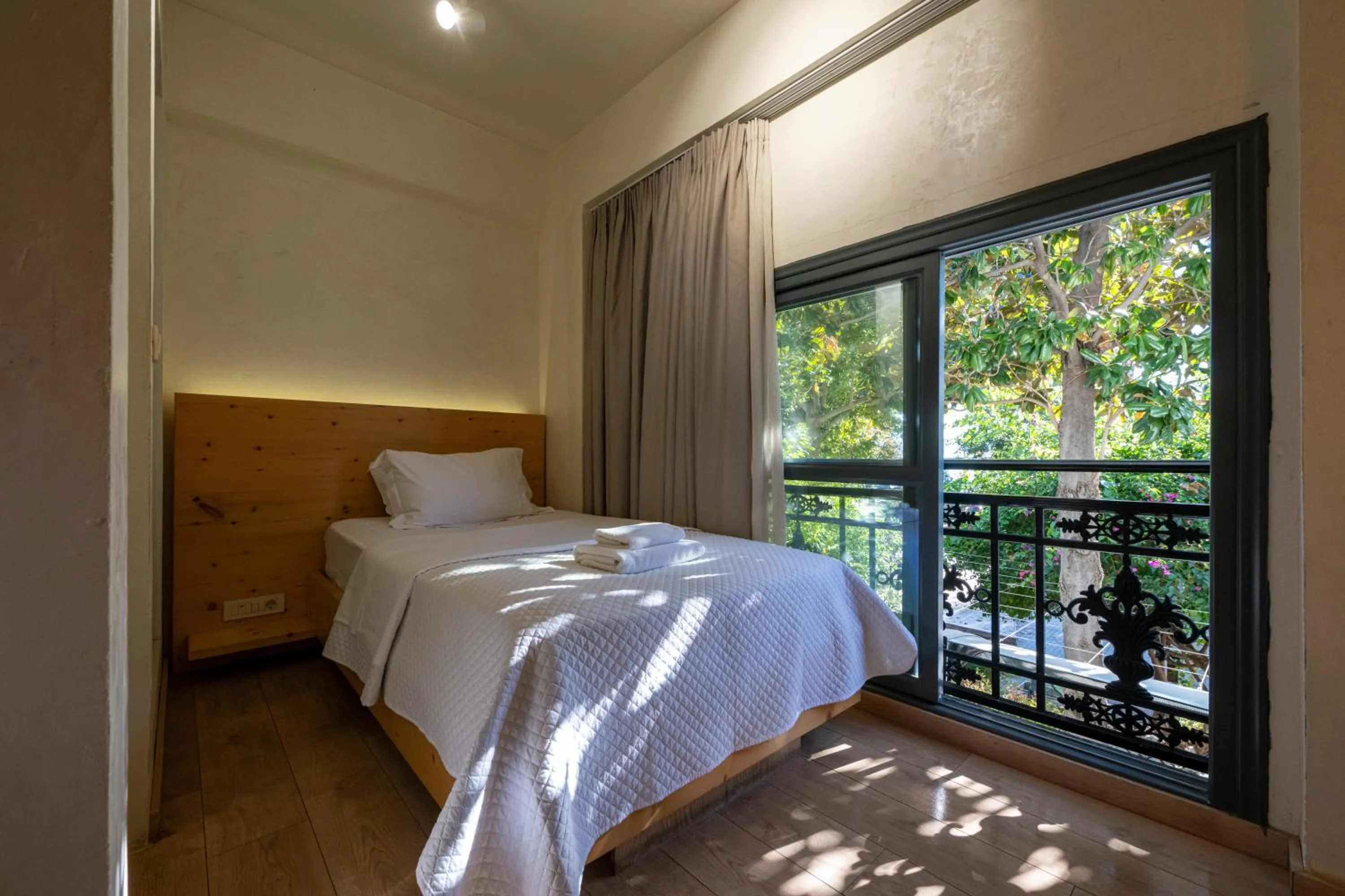 Photo of the whole room, Bed in Panellinion Luxury Rooms