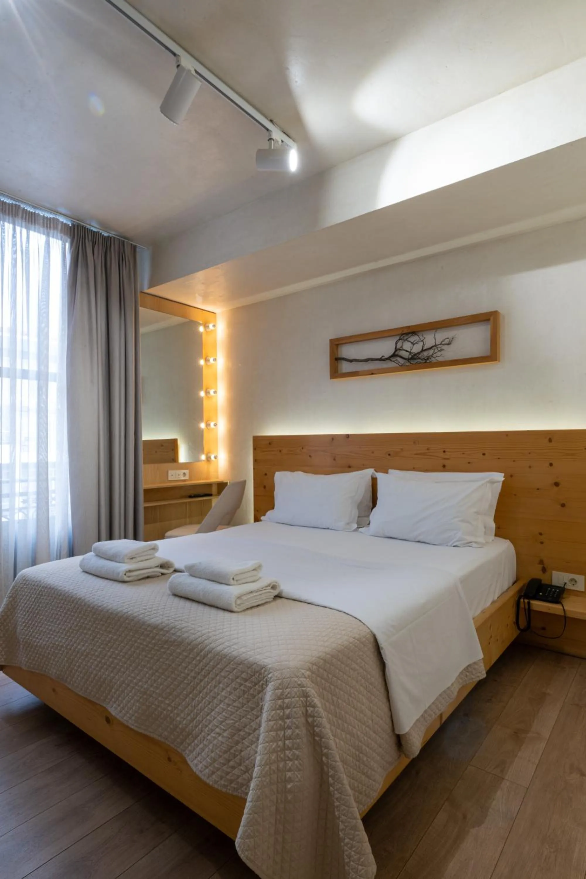 Photo of the whole room, Bed in Panellinion Luxury Rooms