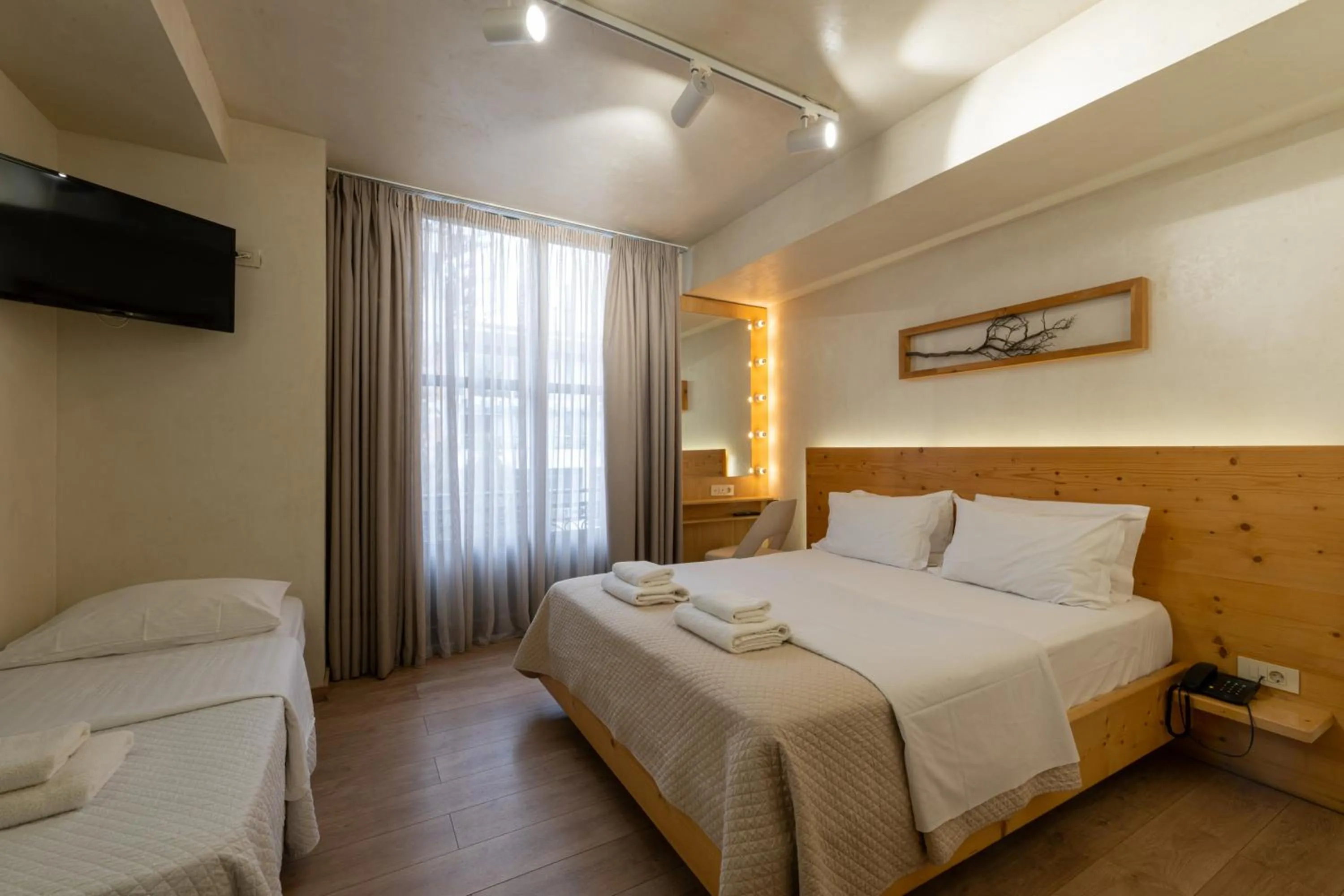 TV and multimedia, Bed in Panellinion Luxury Rooms