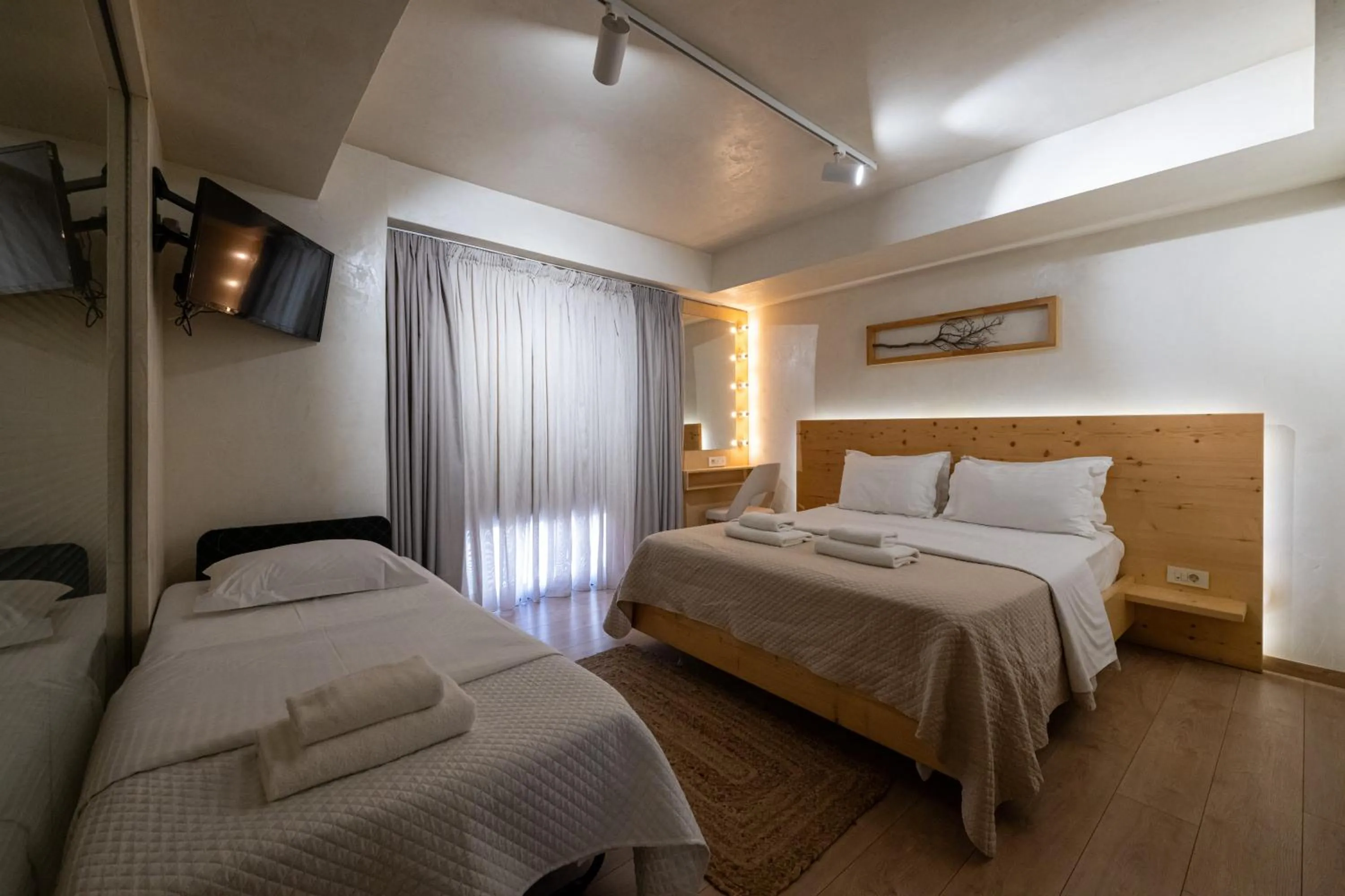 Bed in Panellinion Luxury Rooms