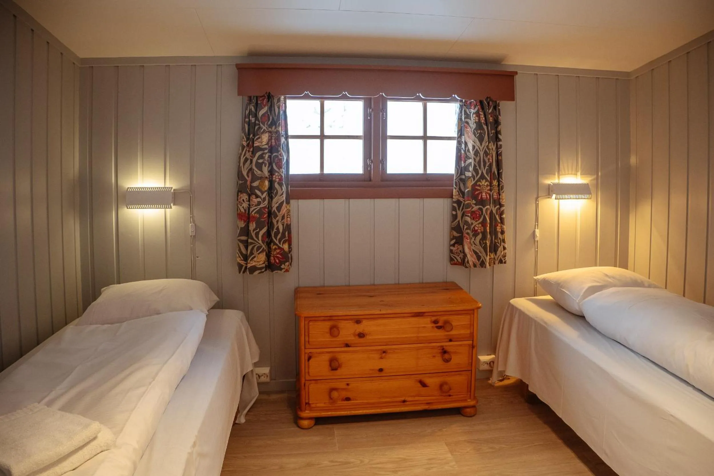 Bed in Hunderfossen Cottages