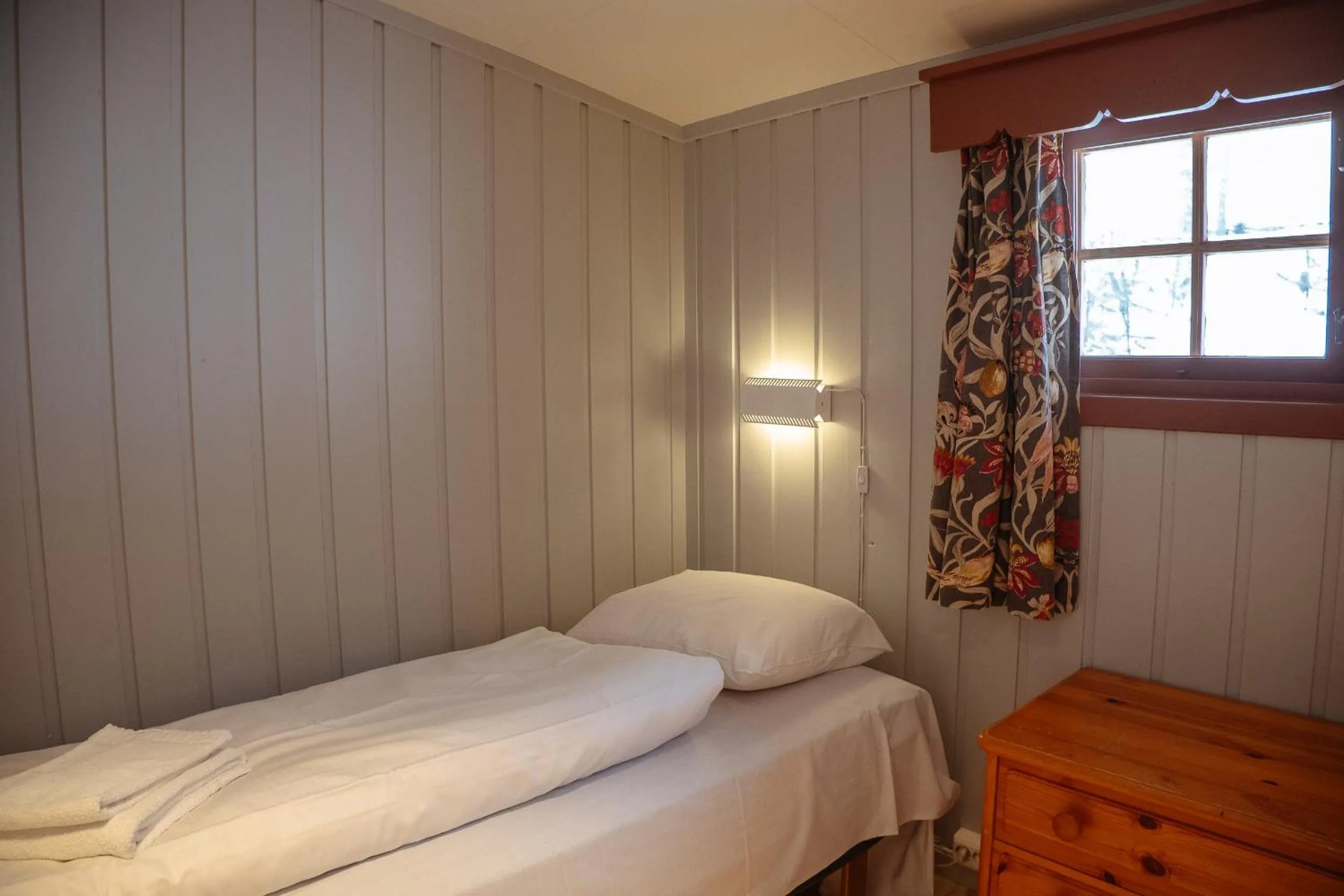 Bed in Hunderfossen Cottages