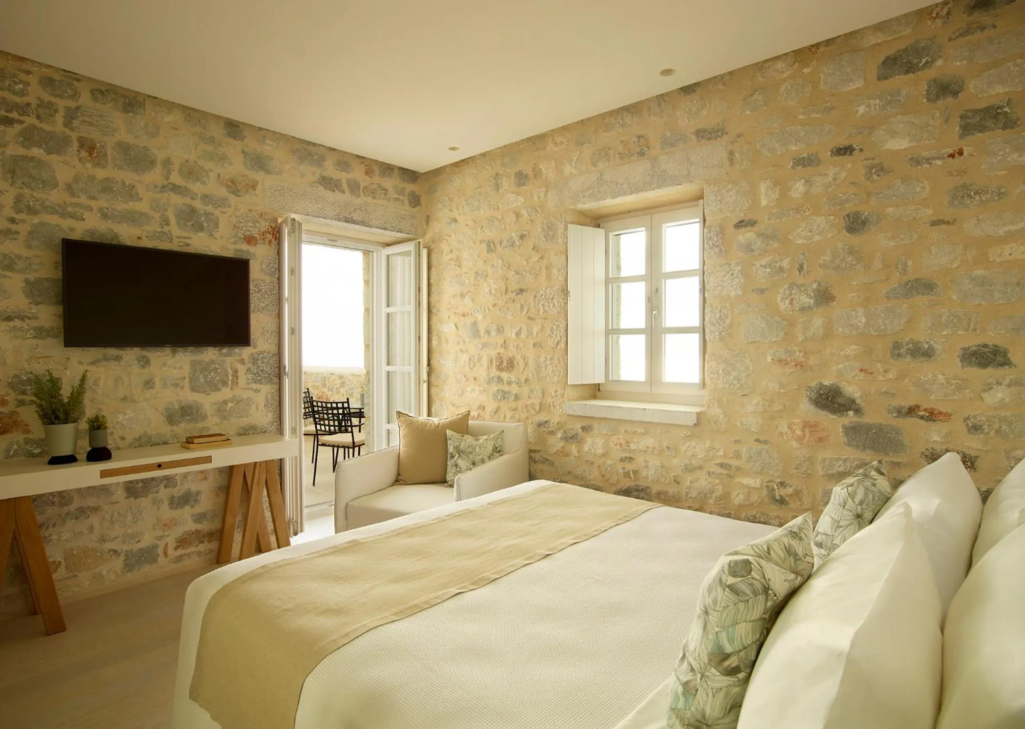 Bed in Ariá Estate Suites & Spa