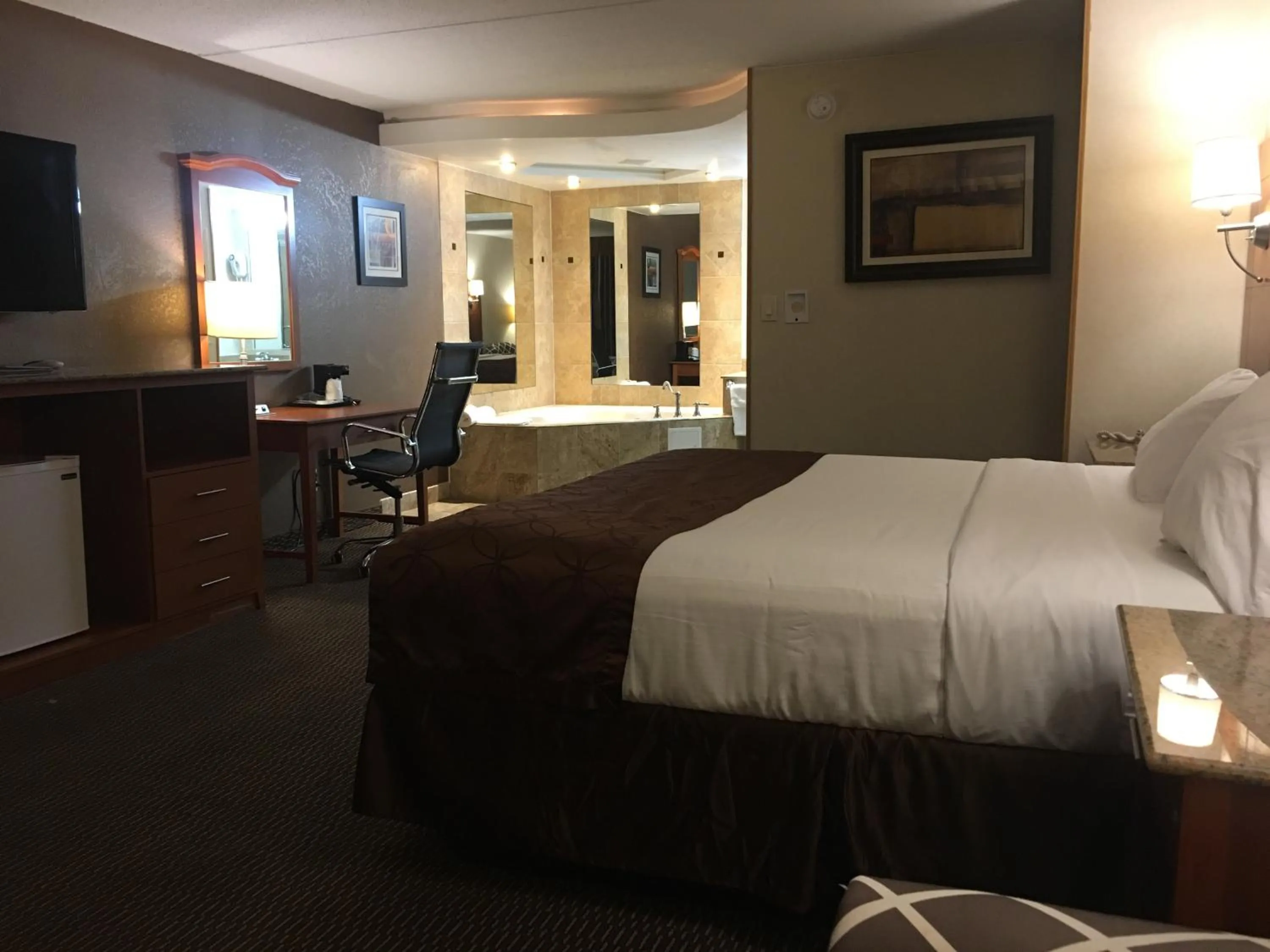 Bed in Ramada by Wyndham Rockville Centre