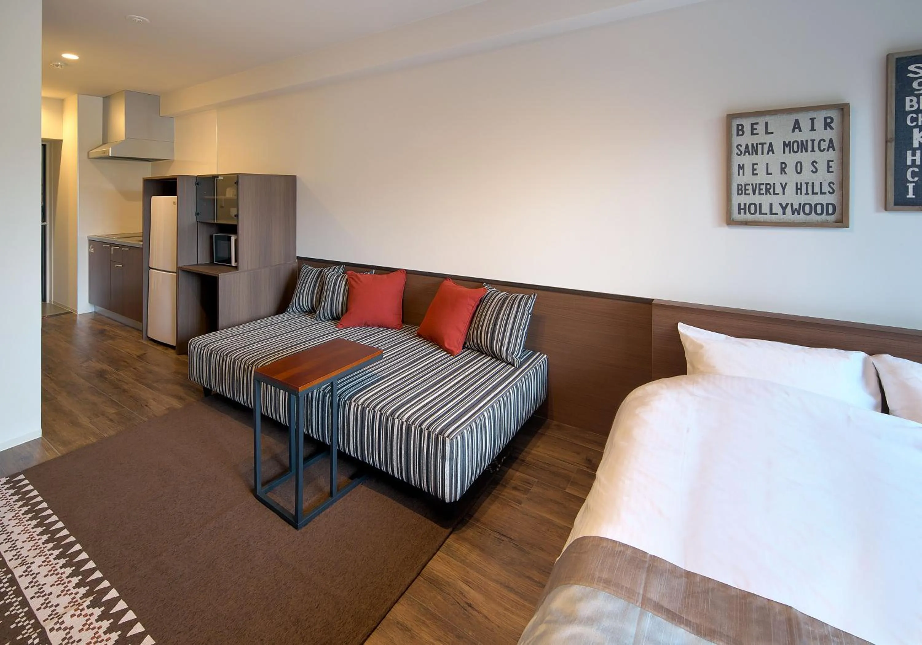 Living room, Bed in e-stay ebisu