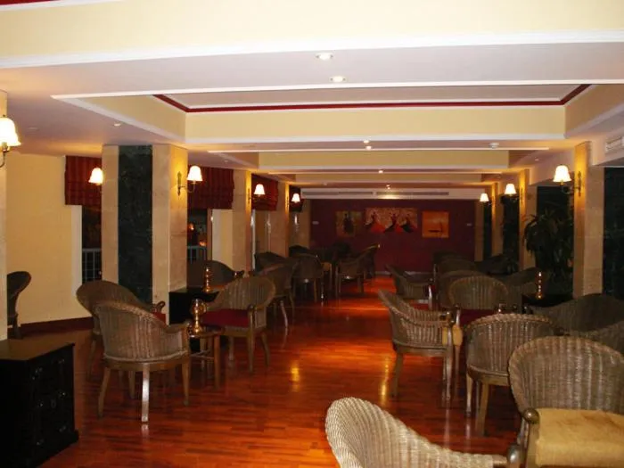 Communal lounge/ TV room in Sea Garden Hotel