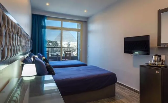 Photo of the whole room, Bed in Pyramids View Inn Bed & Breakfast