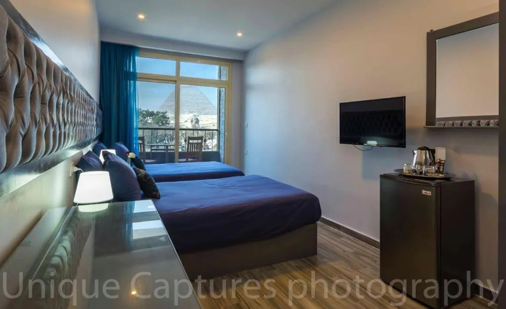 Photo of the whole room, Bed in Pyramids View Inn Bed & Breakfast