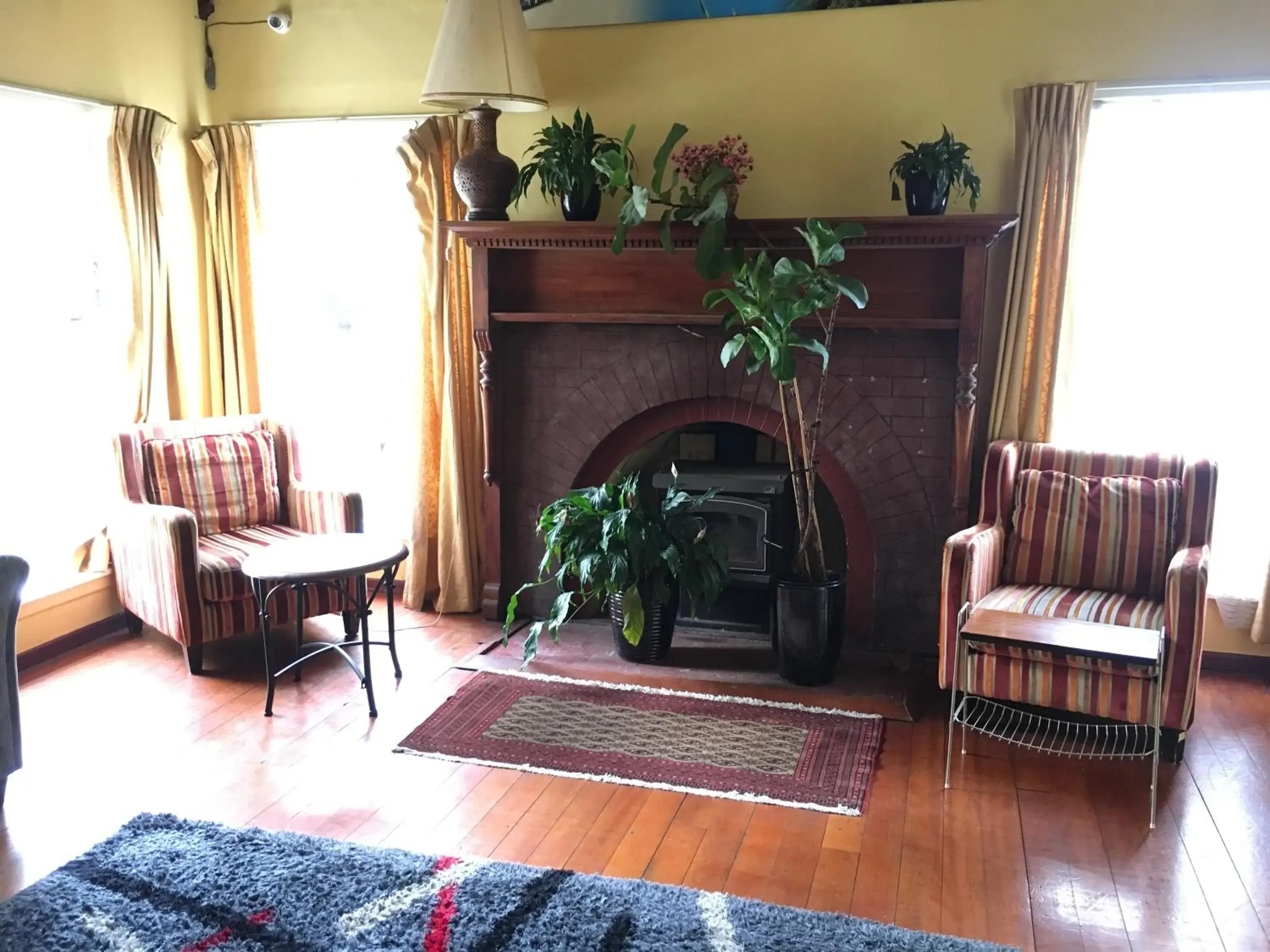 Communal lounge/ TV room, Seating Area in City Garden Lodge