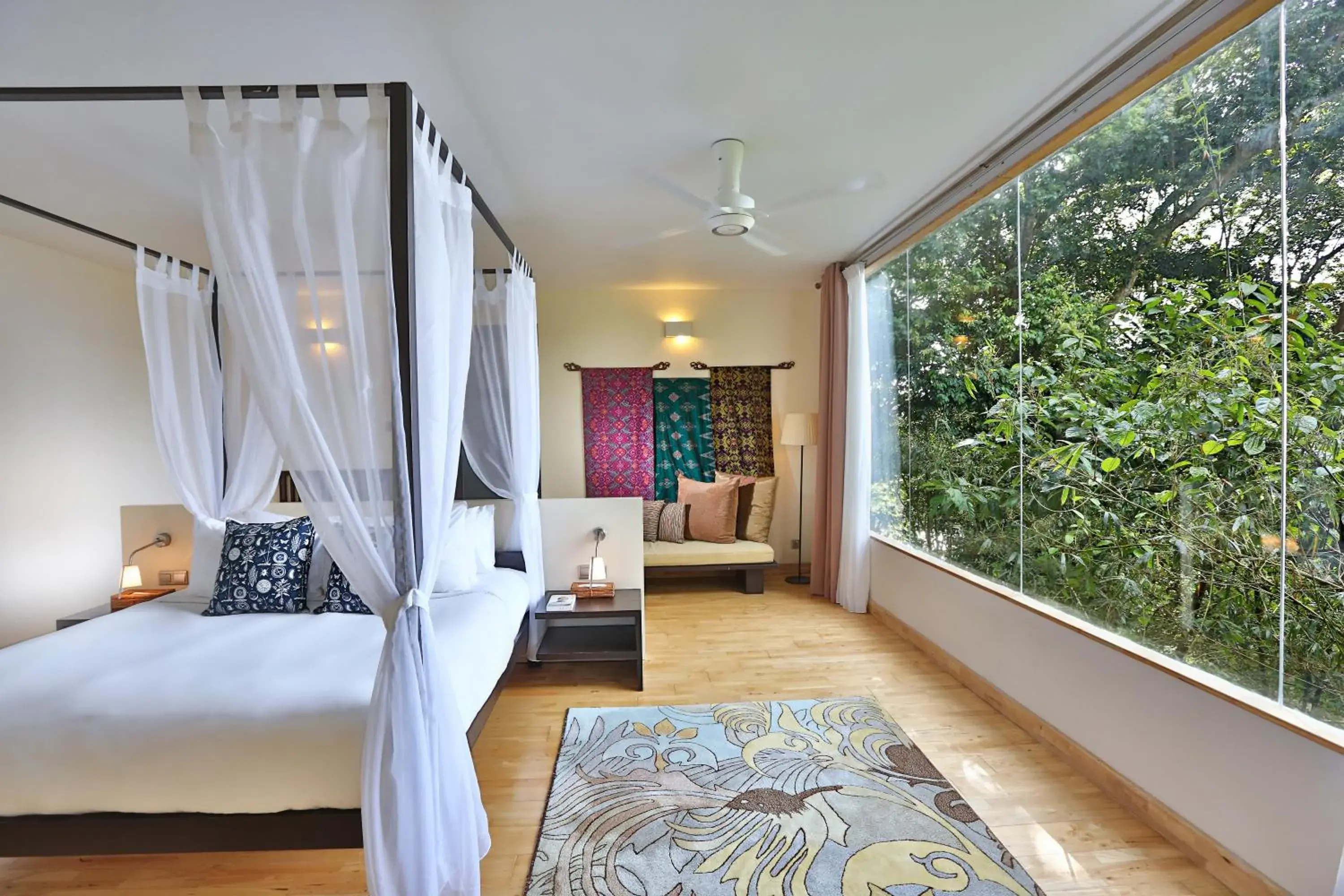 Bed in Ambong Rainforest Retreat Bed in Ambong Rainforest Retreat