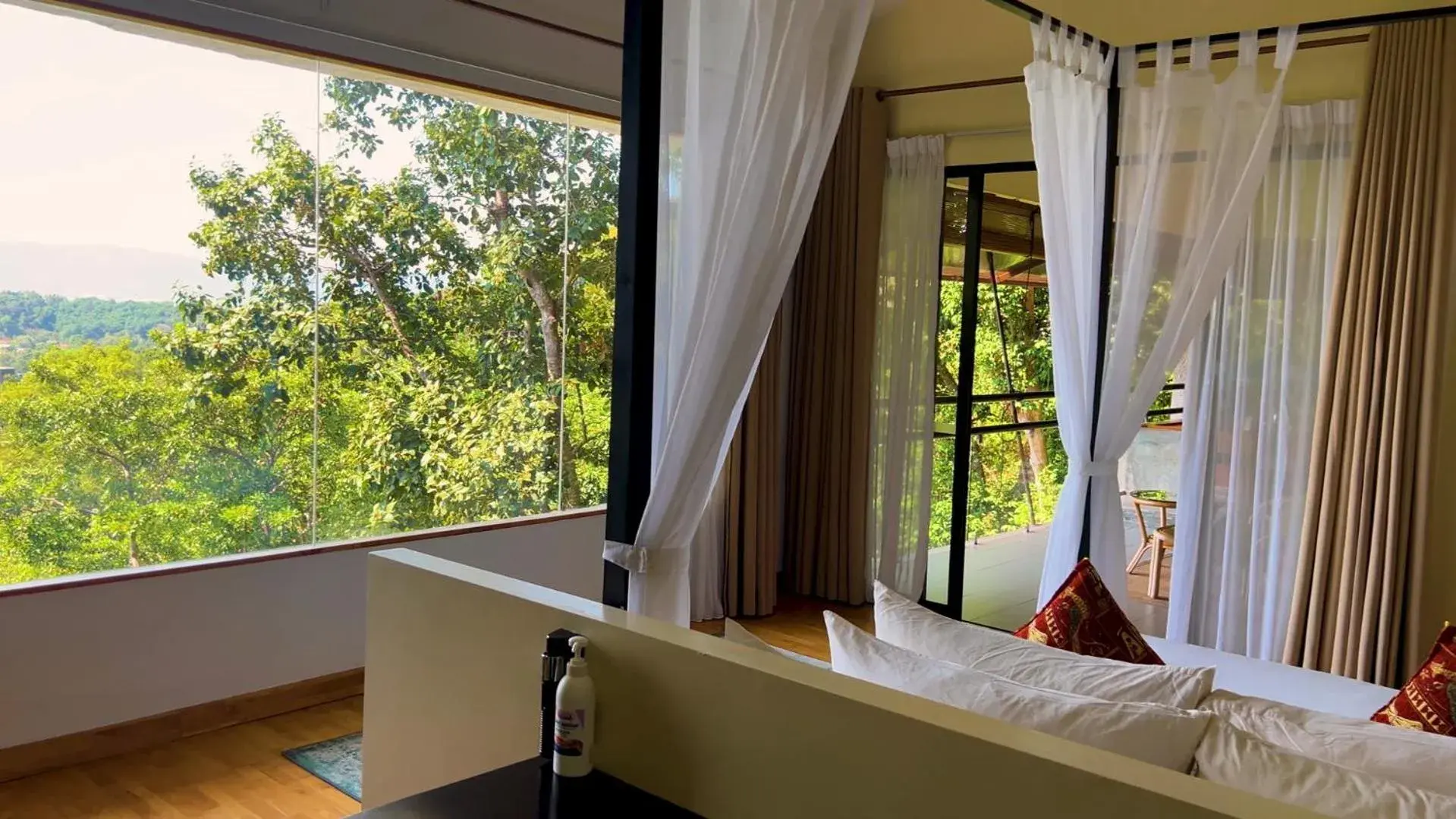 View (from property/room), Bed in Ambong Rainforest Retreat View (from property/room), Bed in Ambong Rainforest Retreat