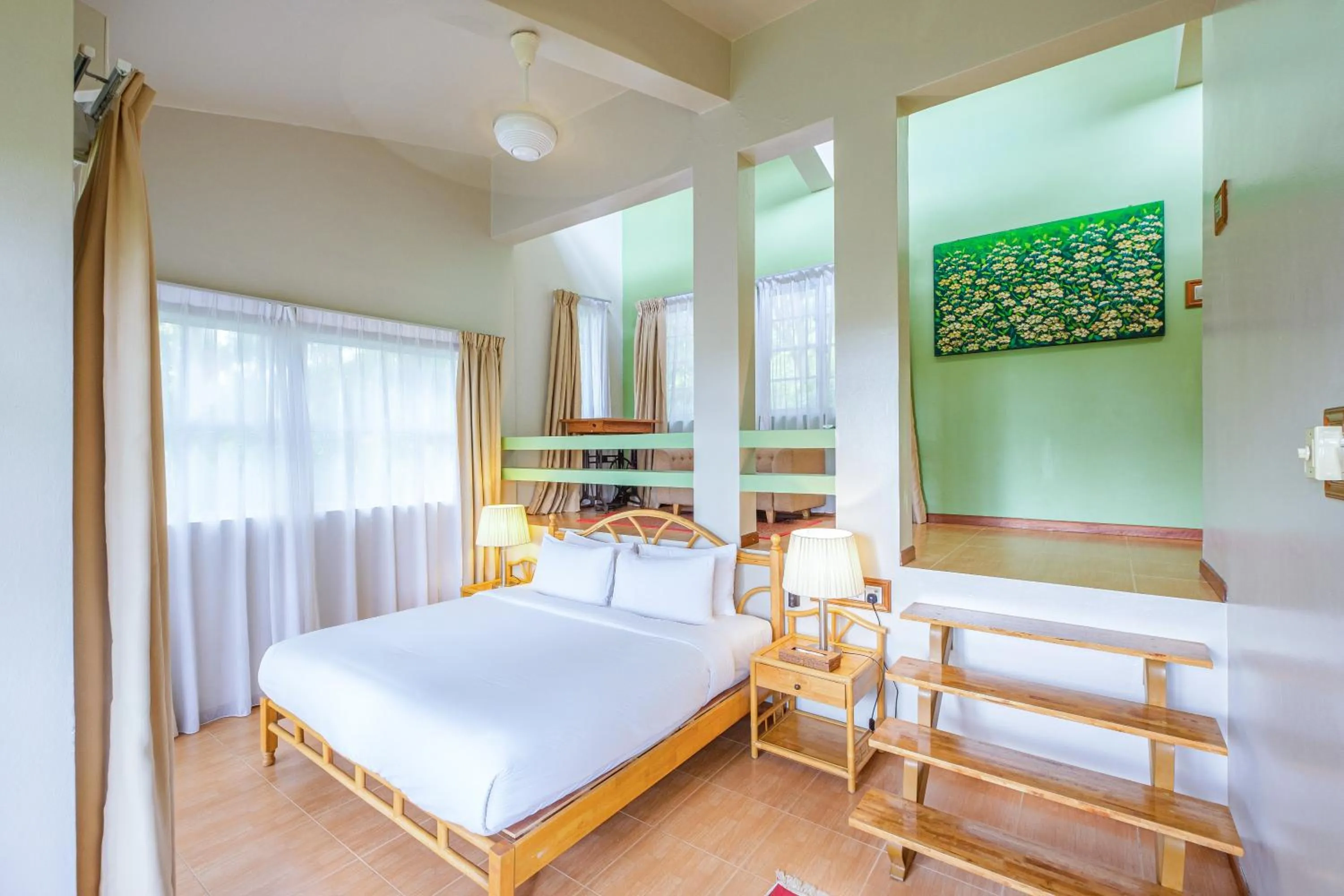 Bed in Ambong Rainforest Retreat