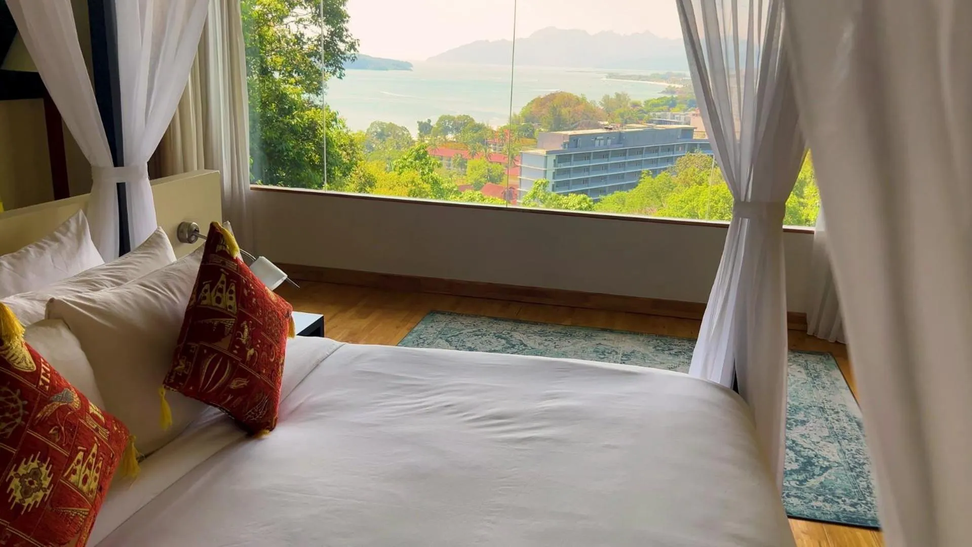 Bed in Ambong Rainforest Retreat