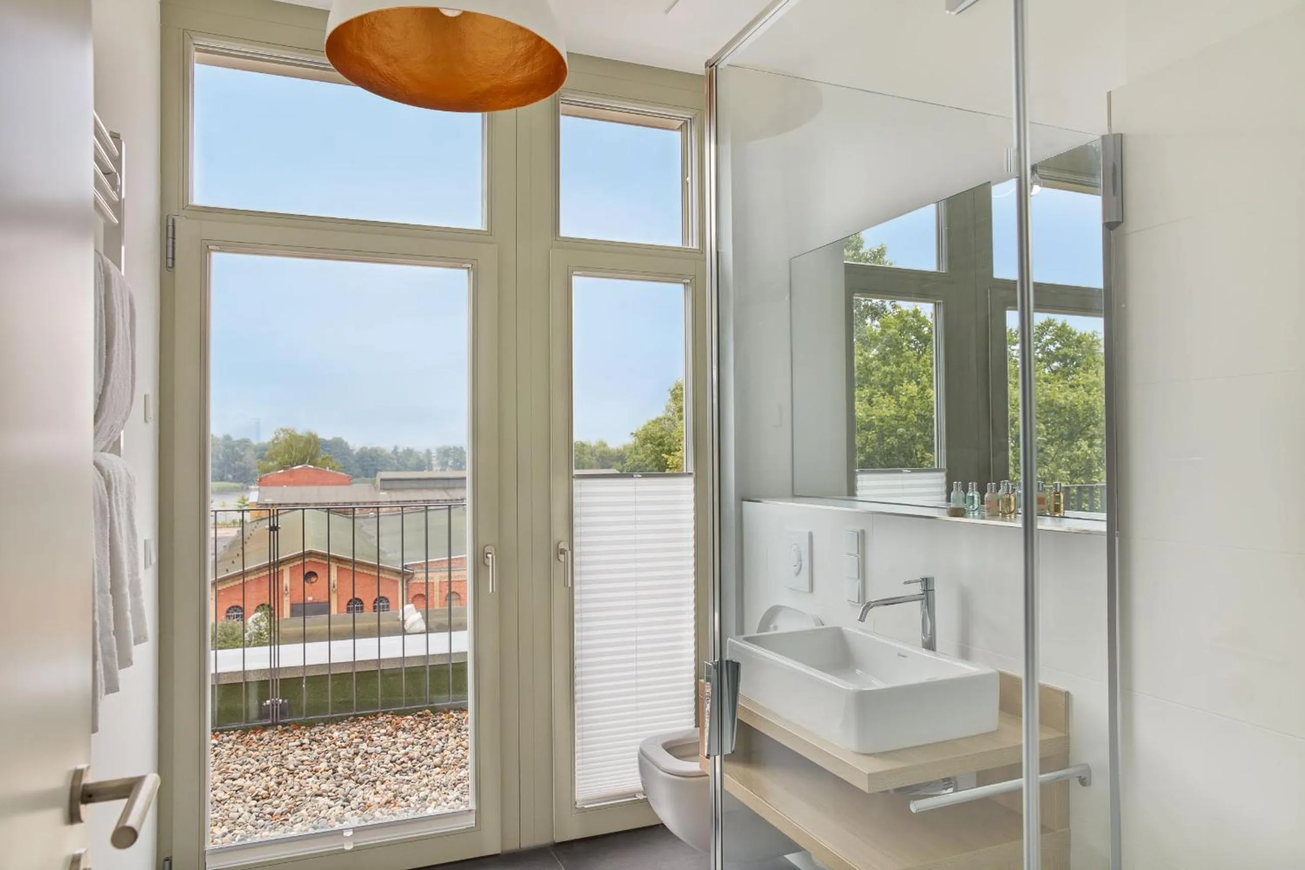 Bathroom in Park Penthouses Insel Eiswerder by Suite030