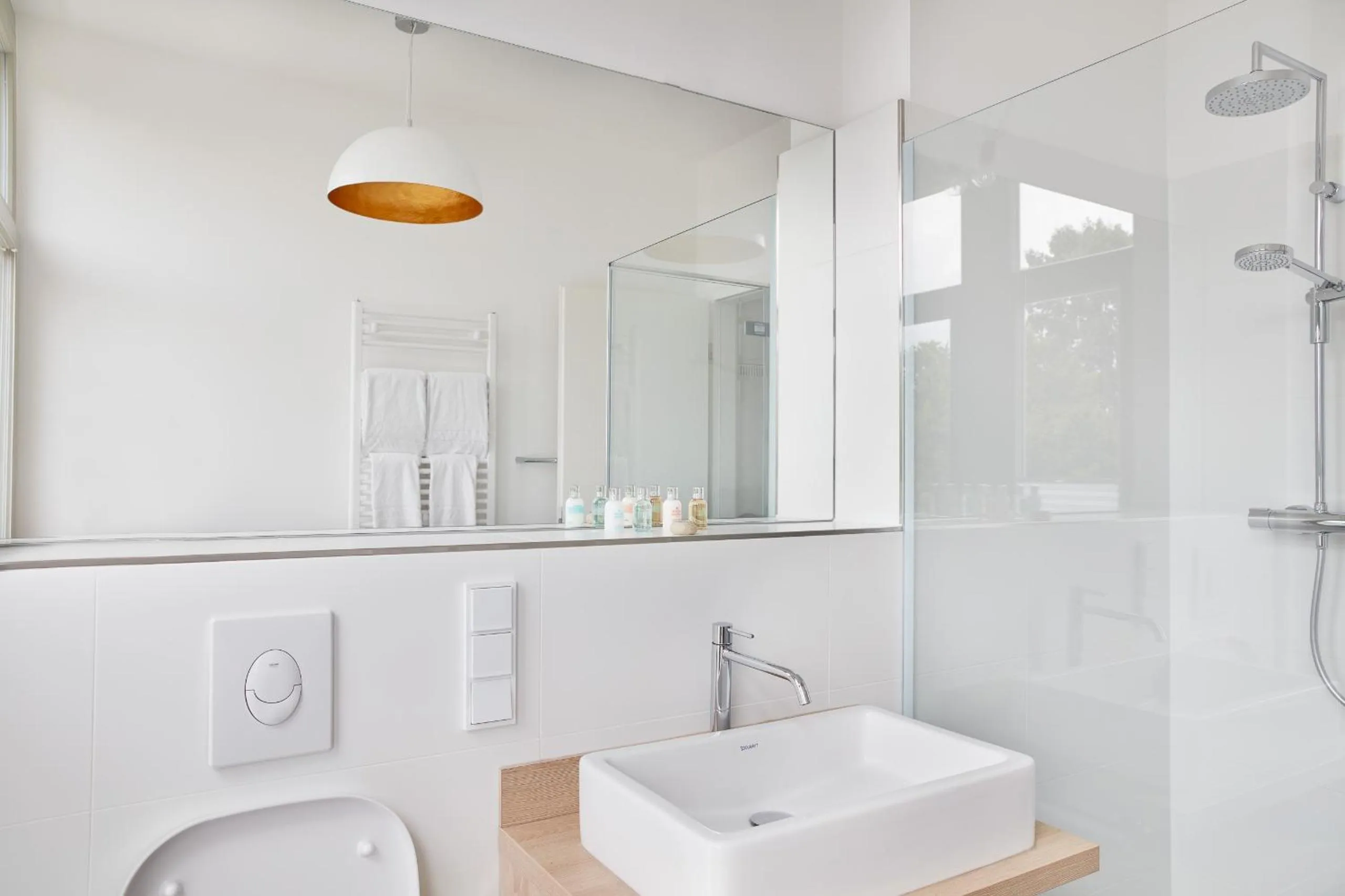 Bathroom in Park Penthouses Insel Eiswerder by Suite030
