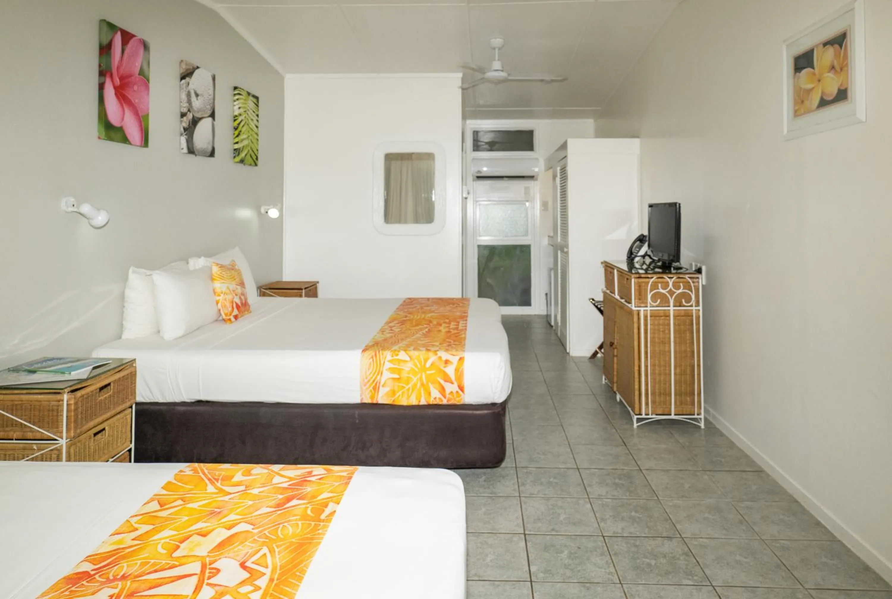 Photo of the whole room, Bed in Club Raro Resort- Adults Only