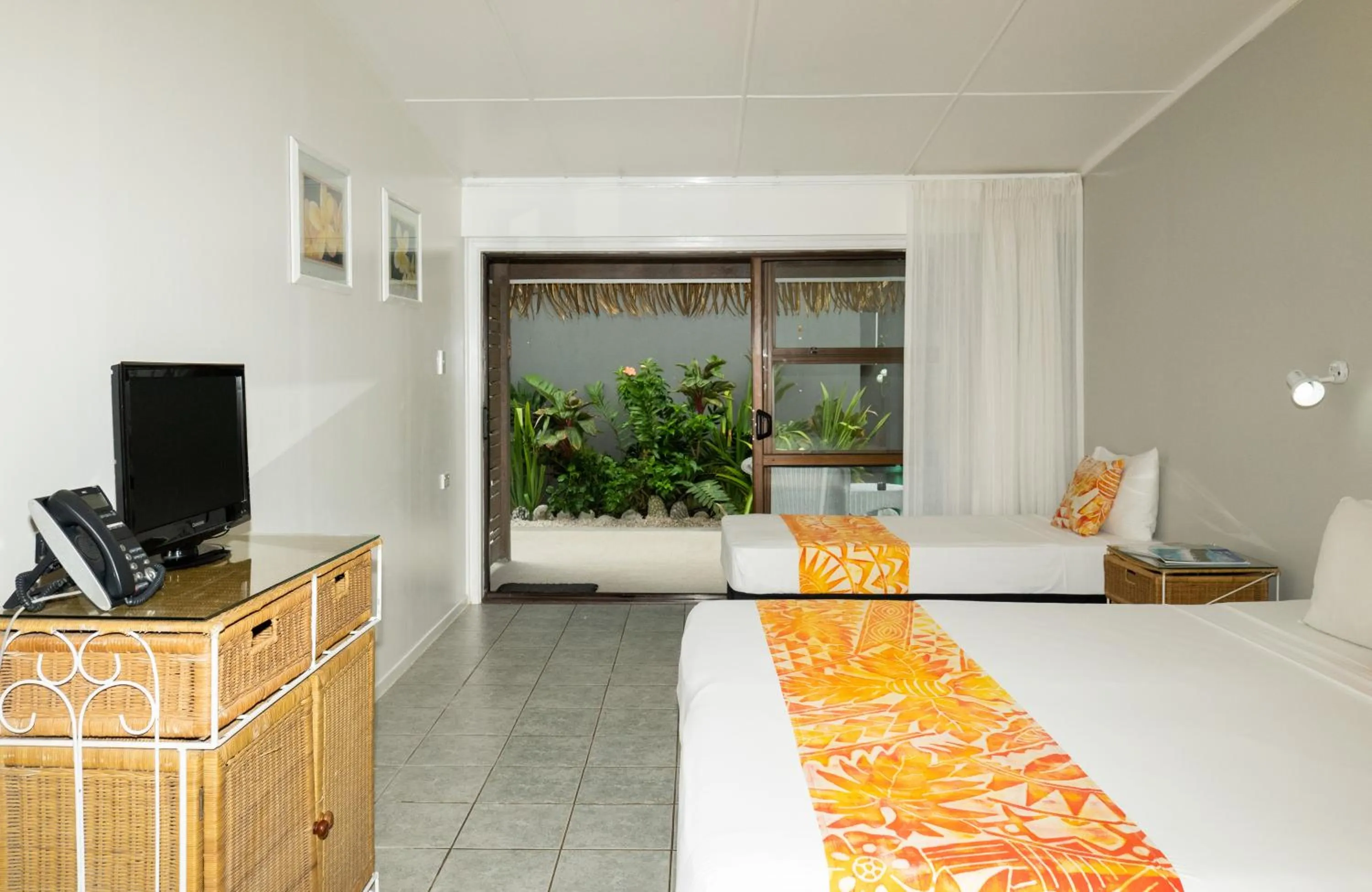 Photo of the whole room, Bed in Club Raro Resort- Adults Only