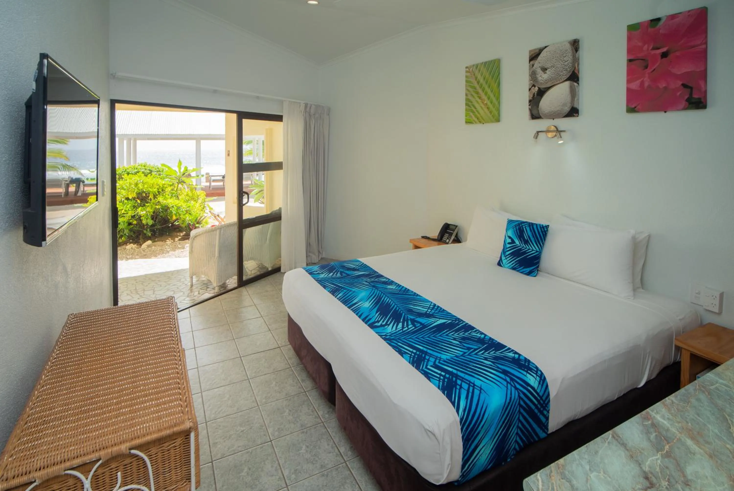 Photo of the whole room, Bed in Club Raro Resort- Adults Only