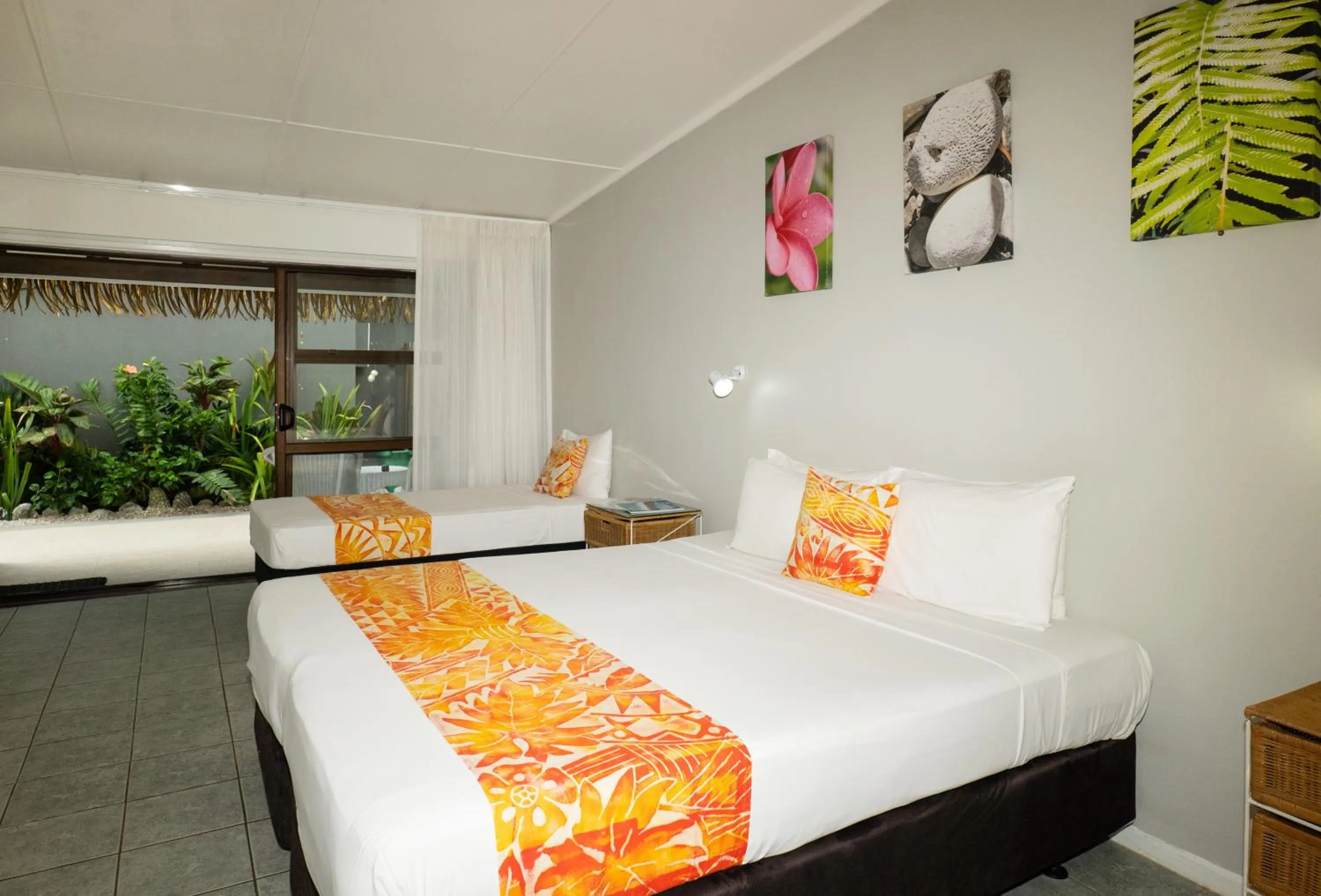 Photo of the whole room, Bed in Club Raro Resort- Adults Only