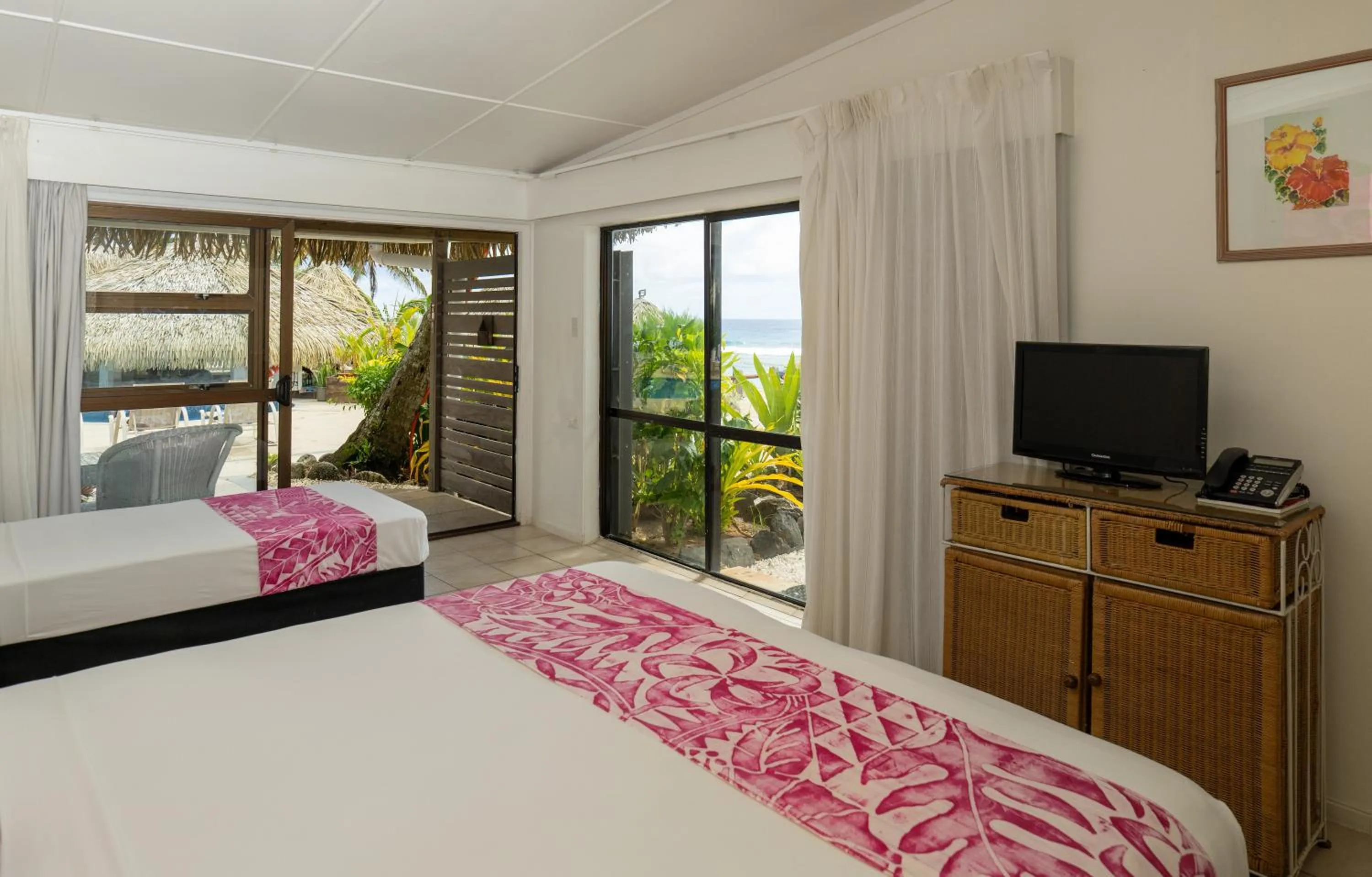 Photo of the whole room, Bed in Club Raro Resort- Adults Only