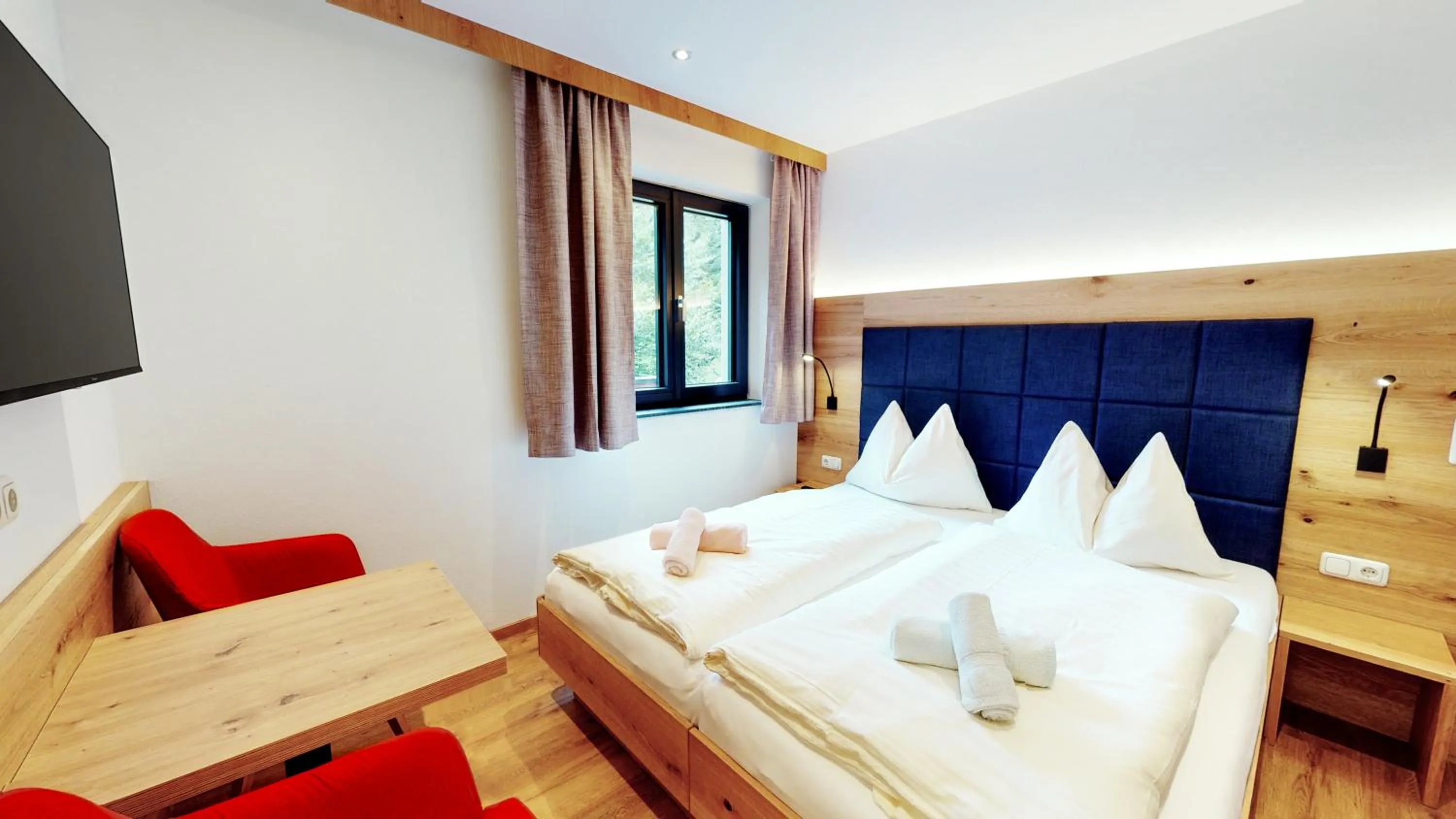 Bed in Pension Lederergütl - Jokercard & Parkplatz inkl