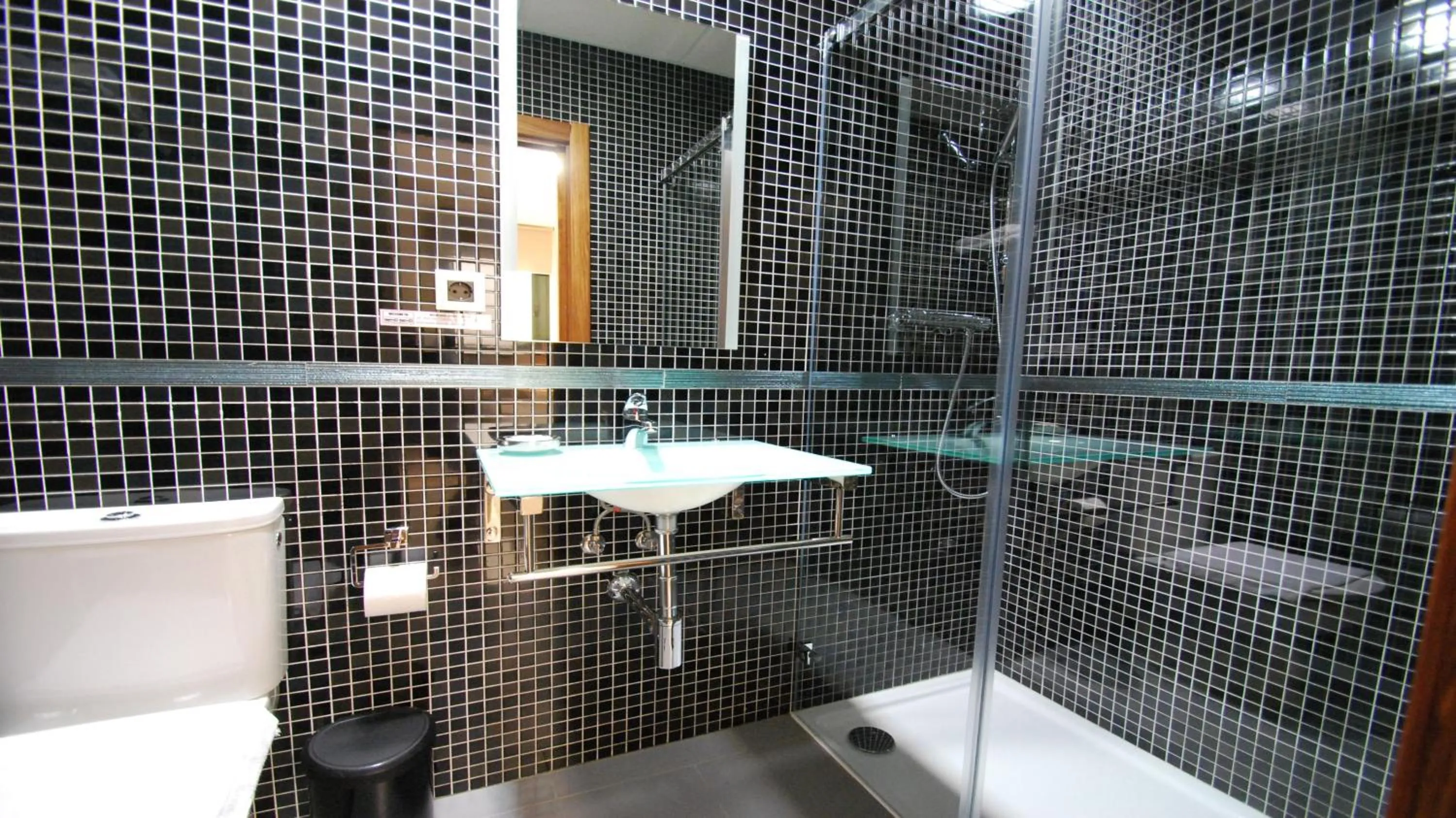 Bathroom in Apartamentos Living Sevilla Centro Maestranza