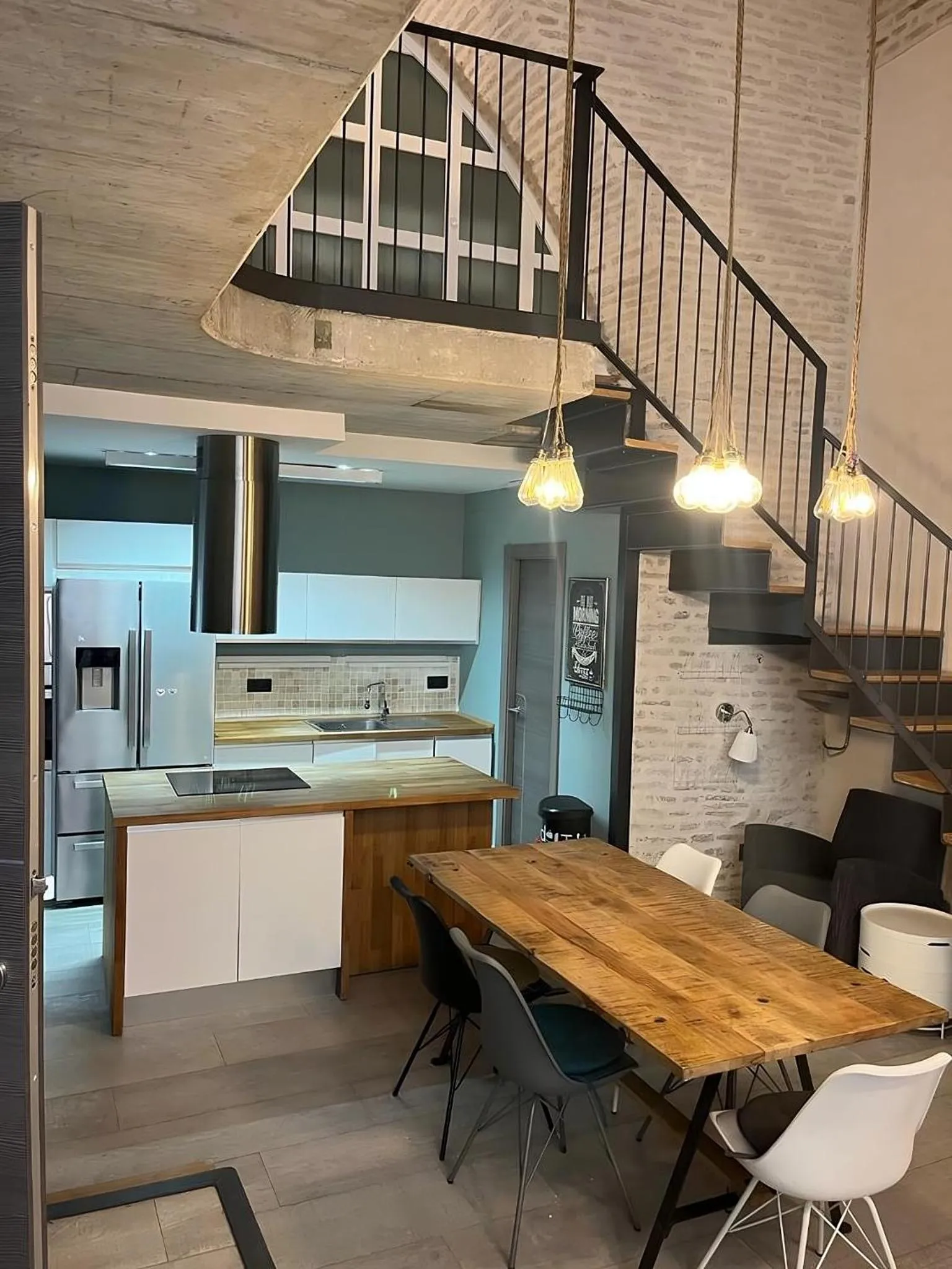 Dining area in Apartamentos Living Sevilla Centro Maestranza