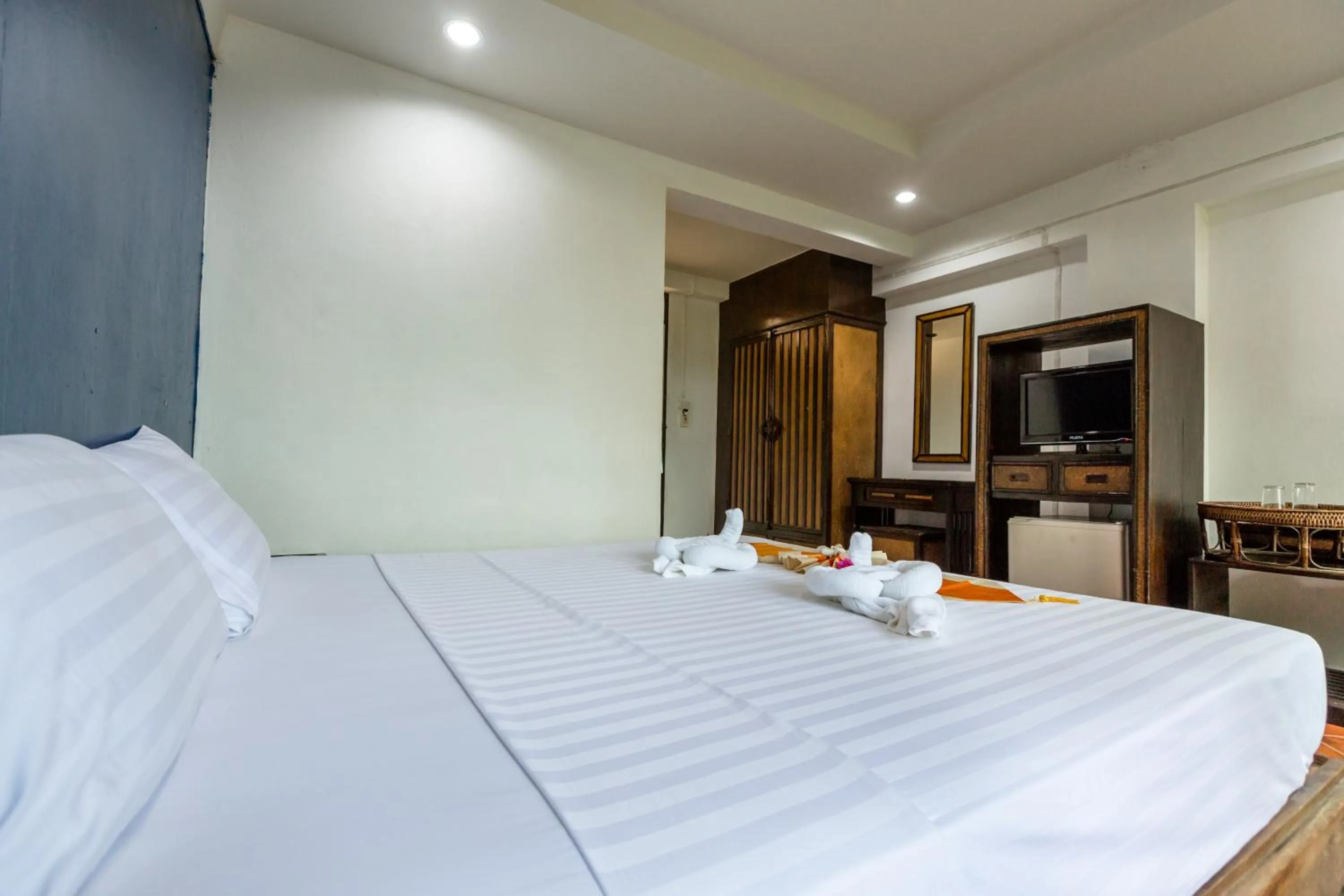 Bed in PorterHouse Beach Hotel