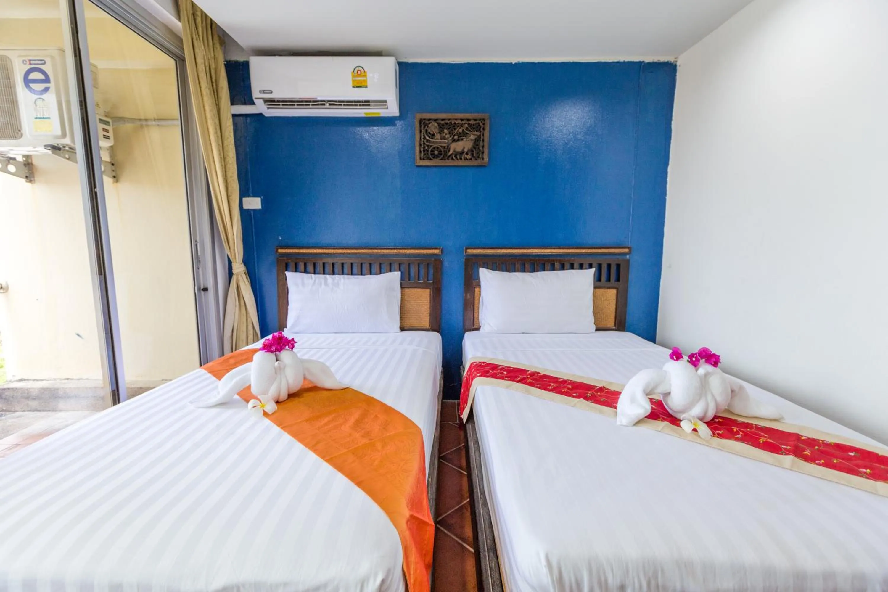 Bed in PorterHouse Beach Hotel