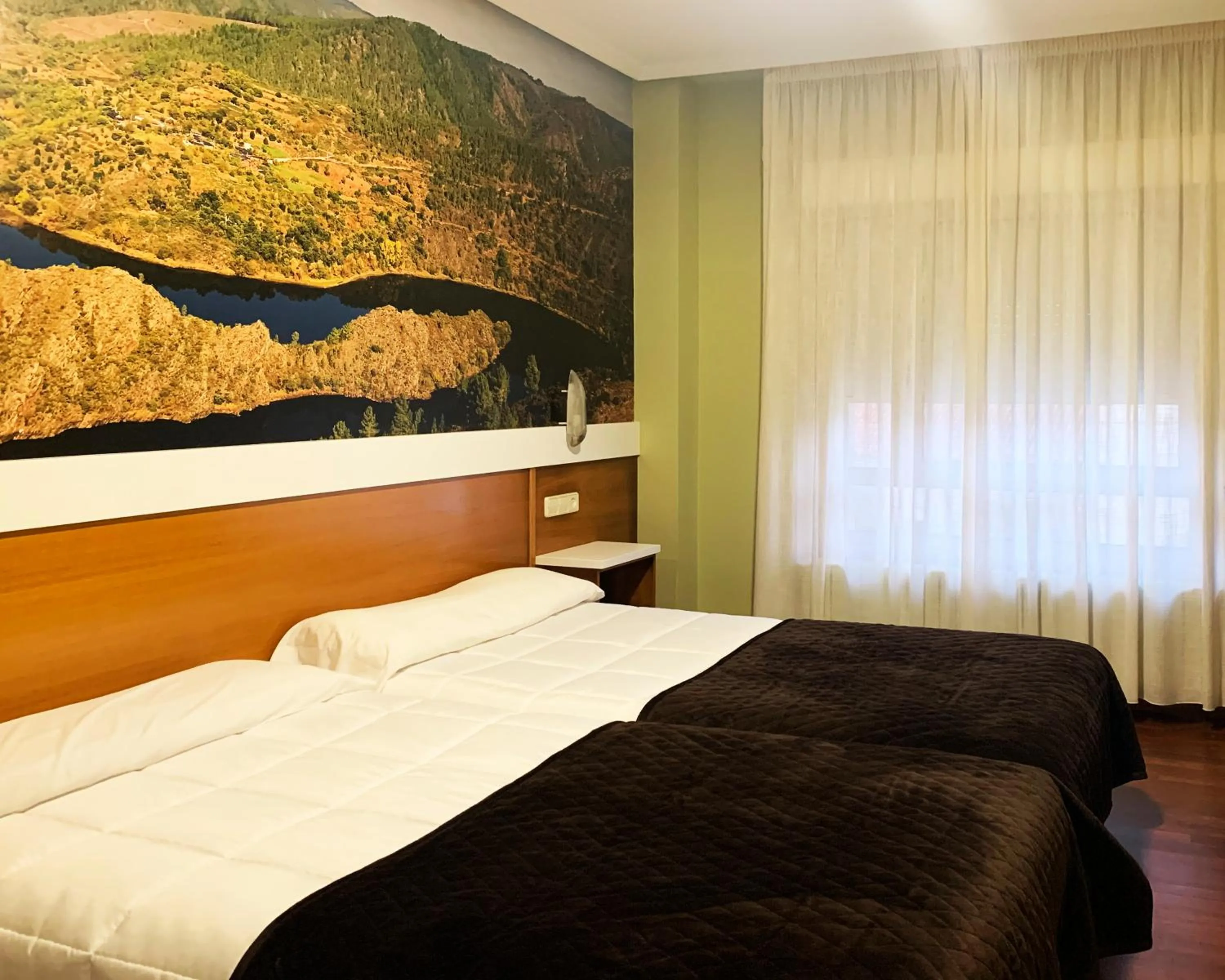 Property building, Bed in Hotel Bello