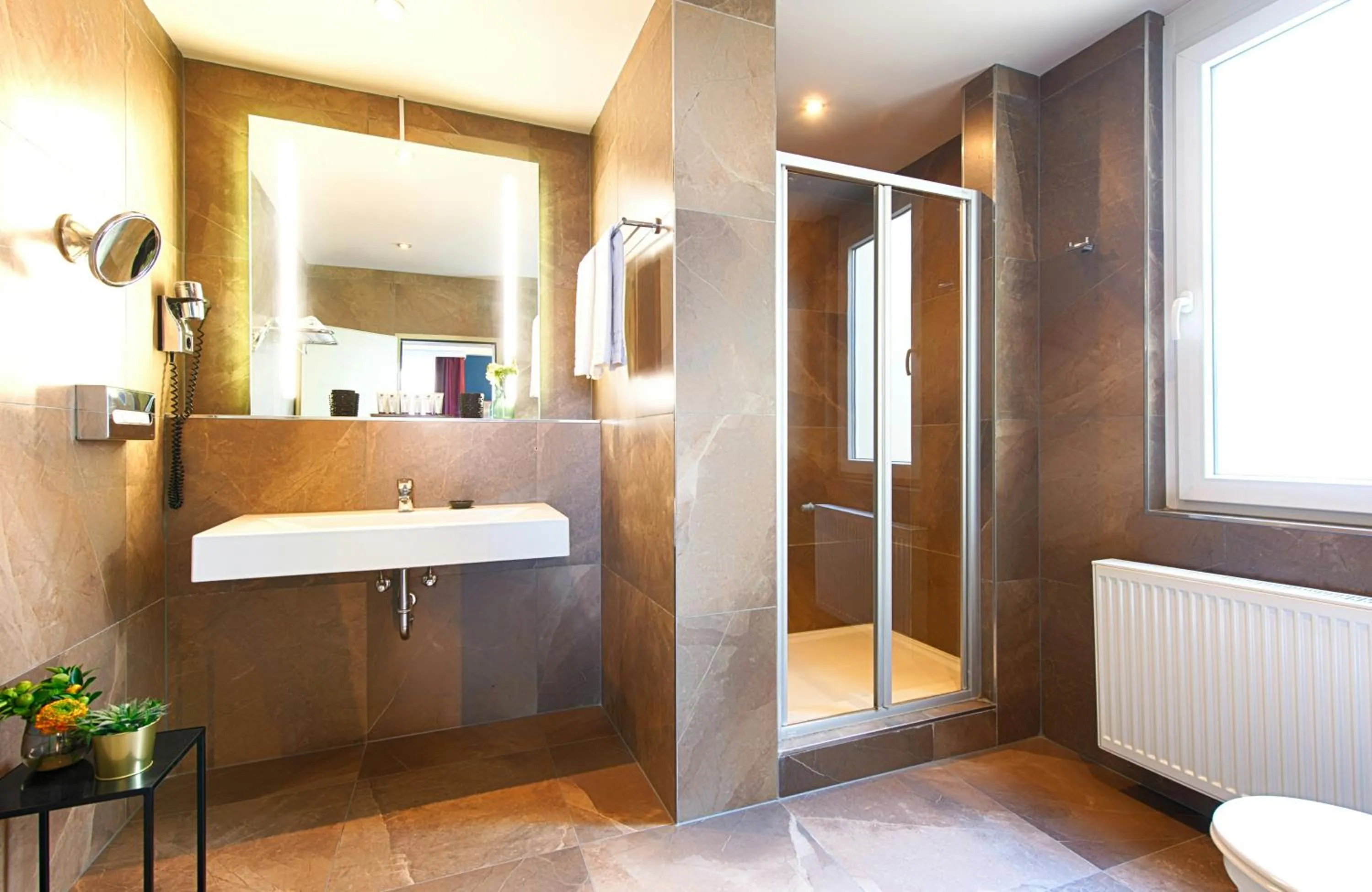 Bathroom in NYX Hotel Mannheim by Leonardo Hotels
