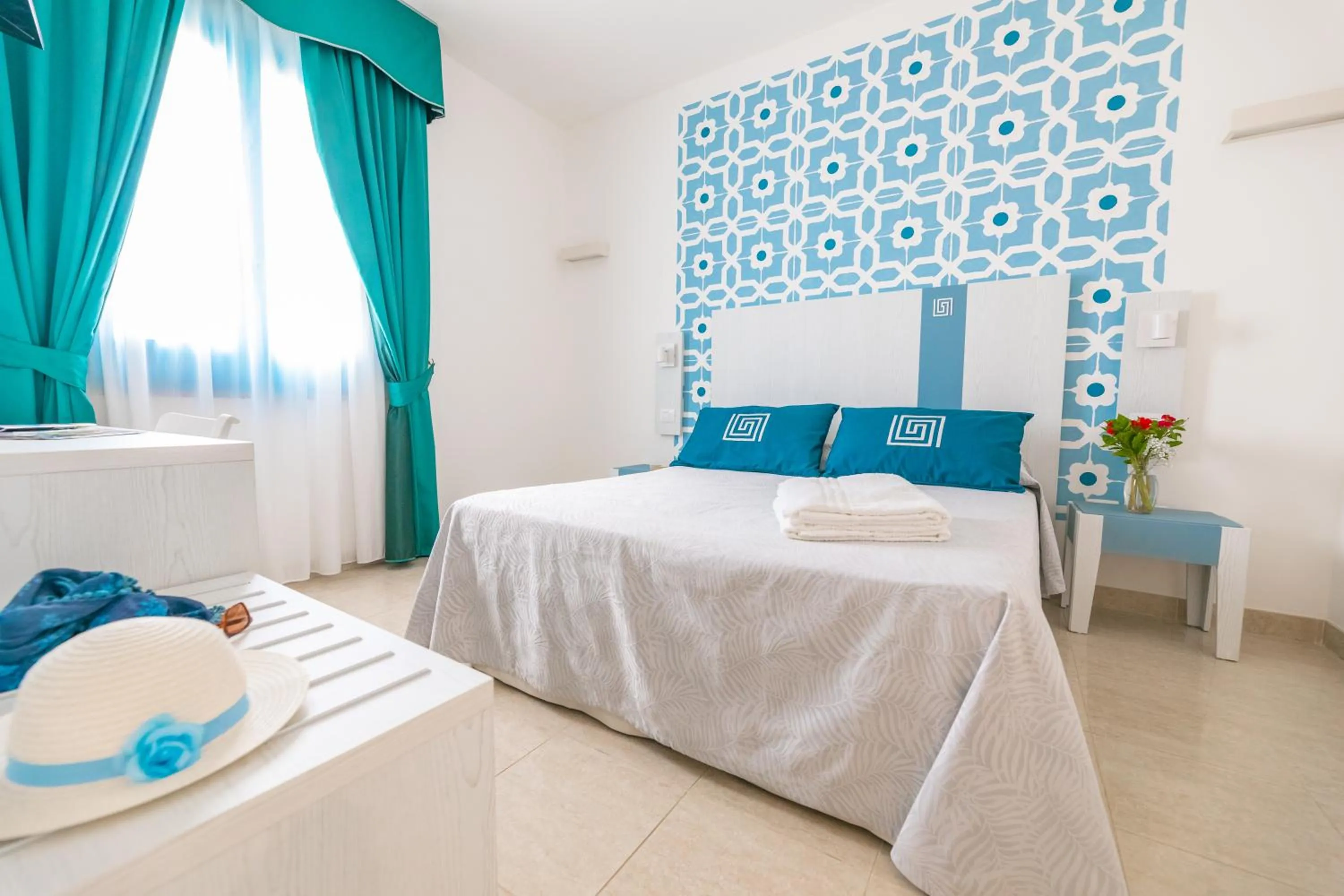 Bed in Hotel Magna Grecia