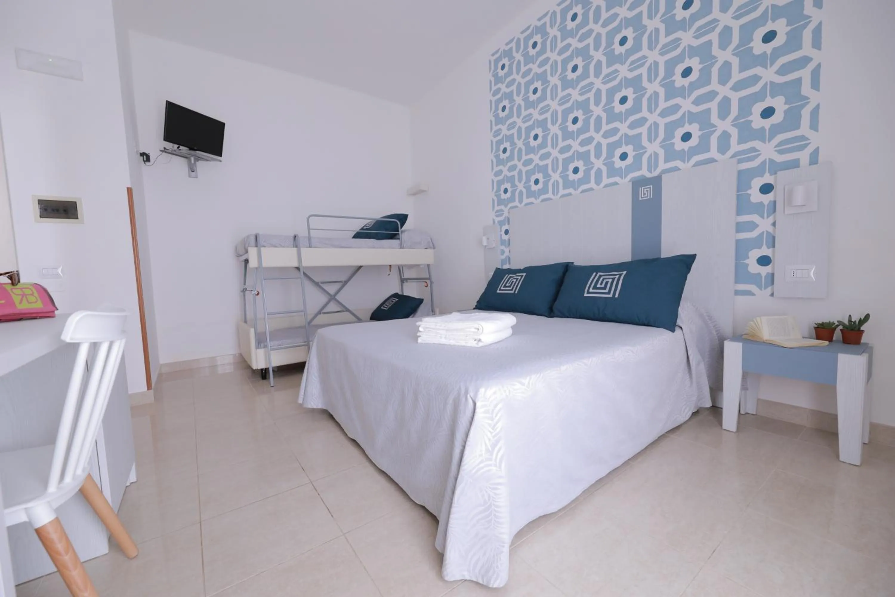 Bed in Hotel Magna Grecia