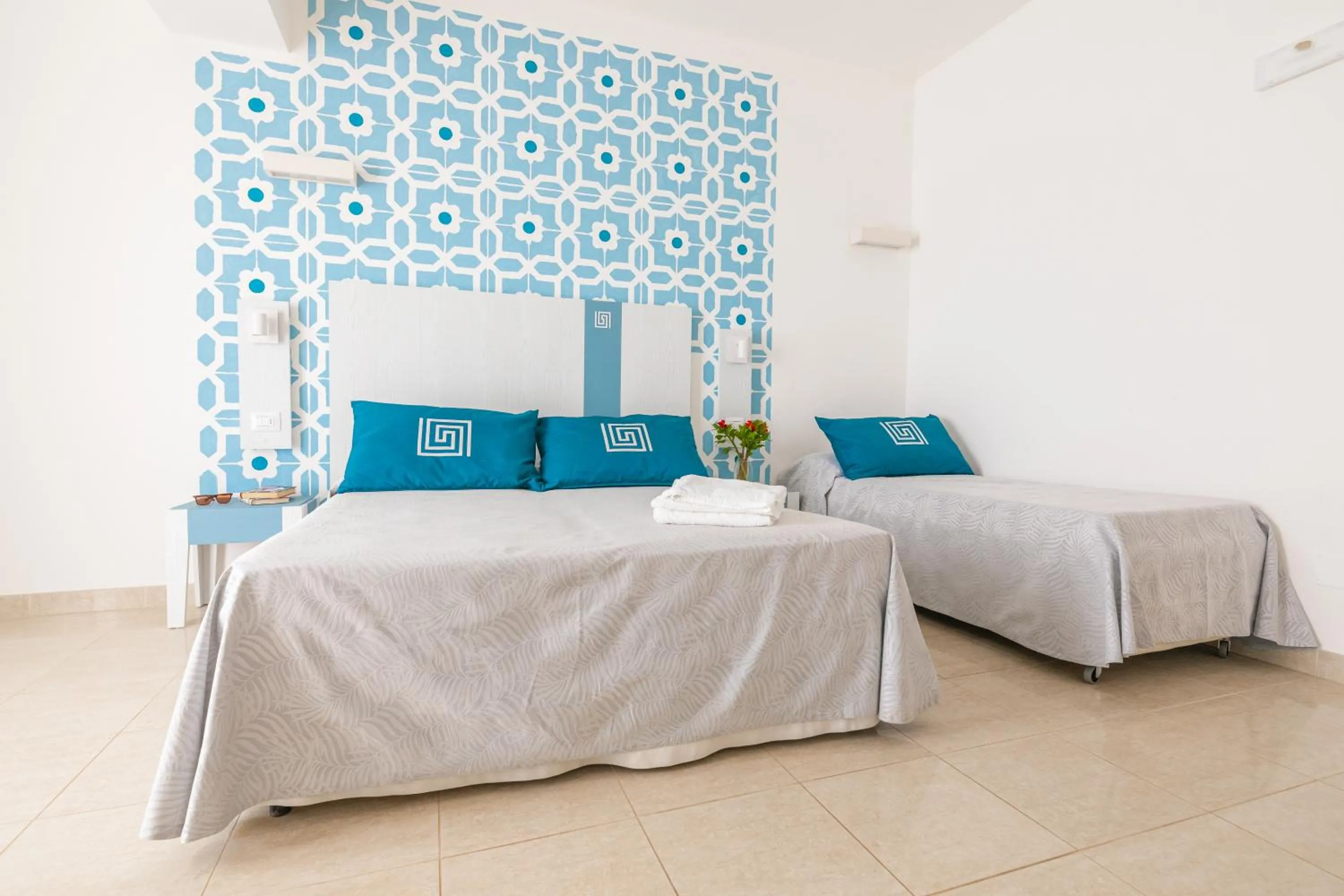 Bed in Hotel Magna Grecia