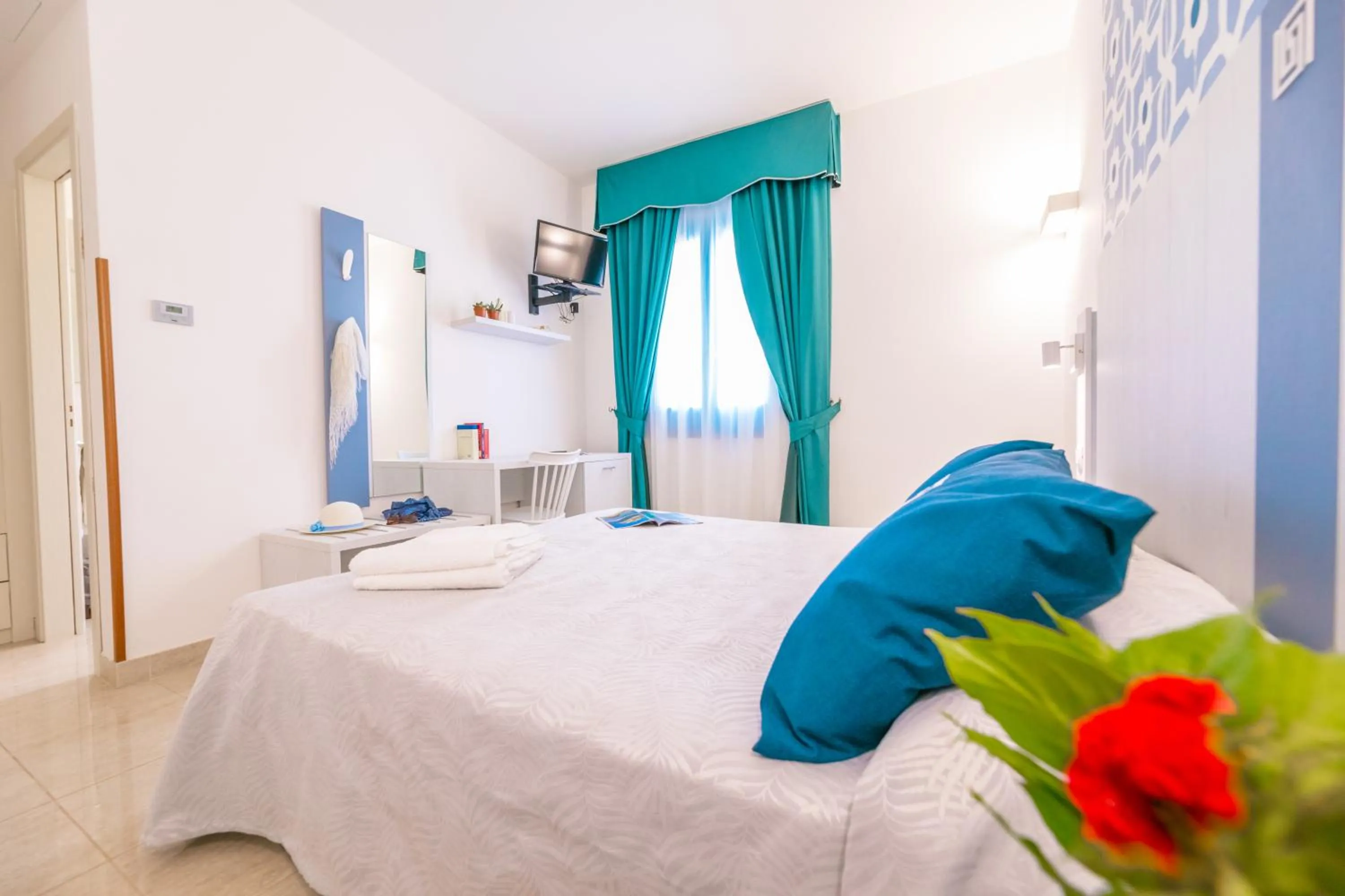 Bed in Hotel Magna Grecia