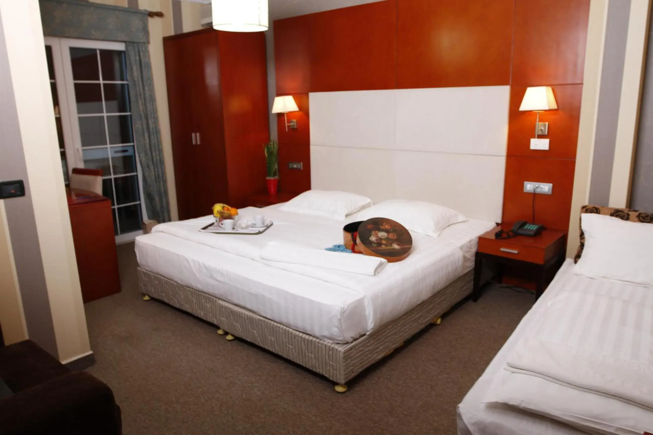 Bed in Bel Conti Hotel Bed in Bel Conti Hotel