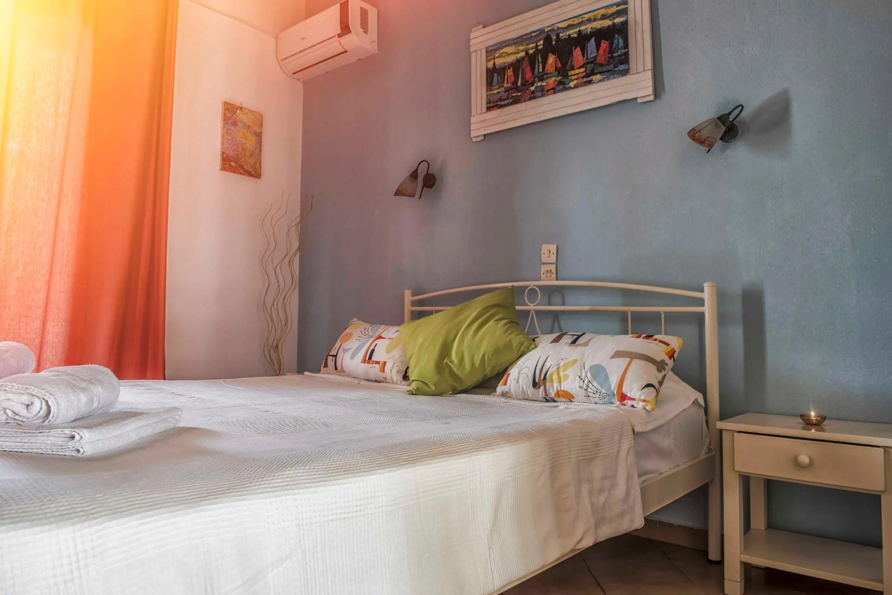 Bed in Elli Beach Apartments and Studios