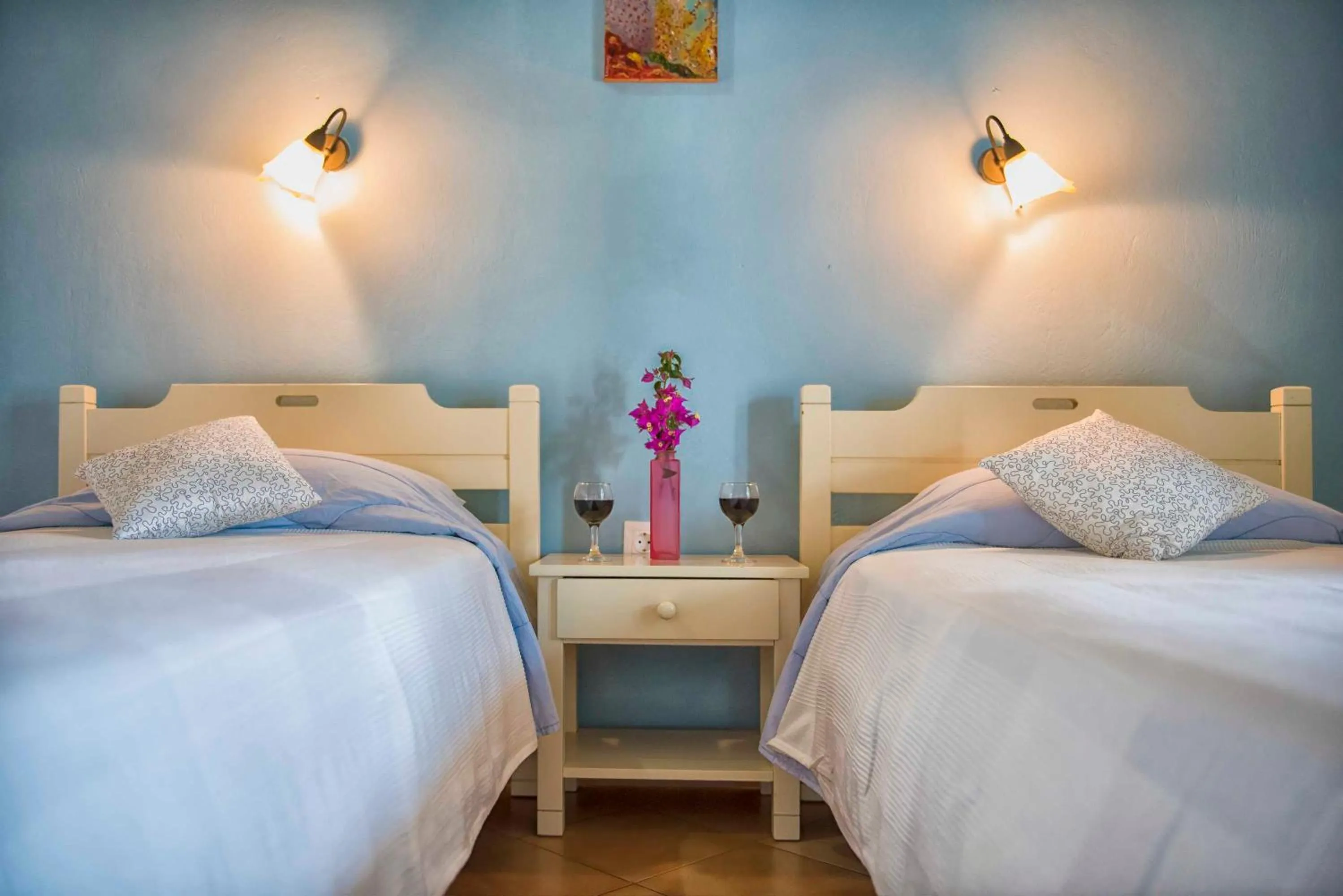 Bed in Elli Beach Apartments and Studios